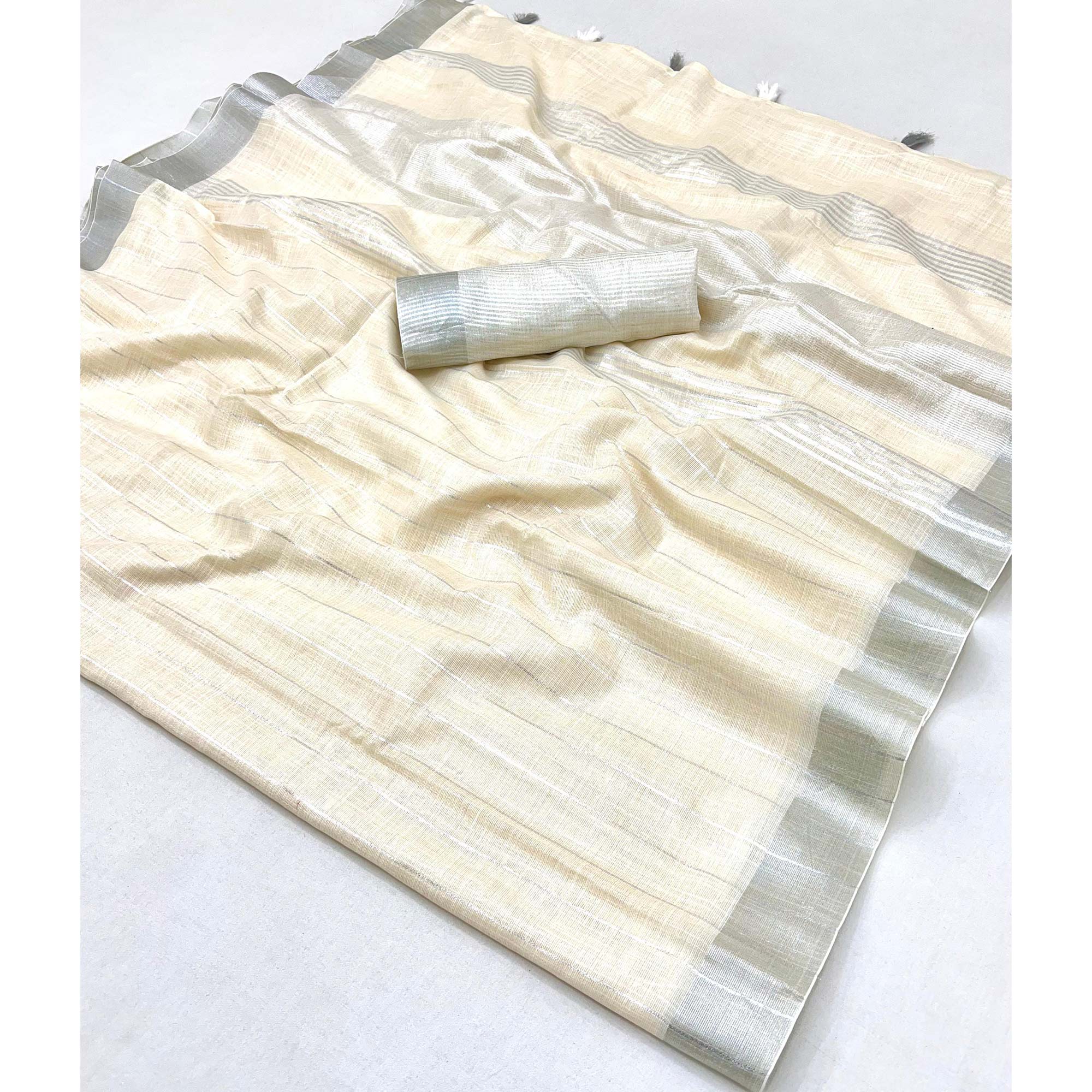 Offwhite Zari Woven Linen Saree With Tassels