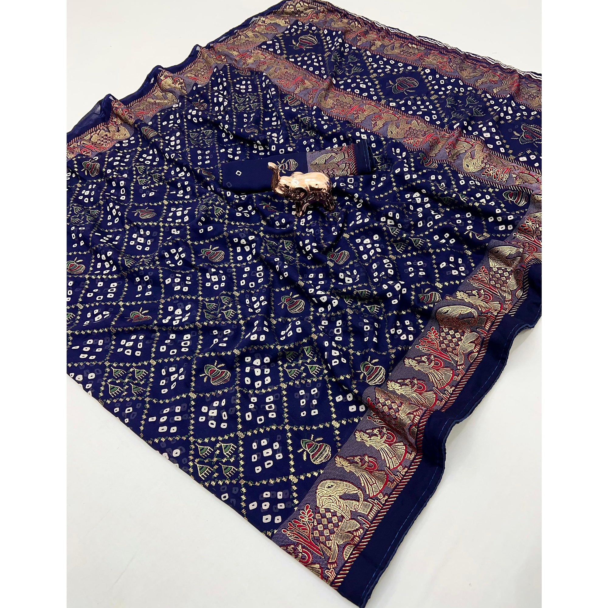 Elegant Navy Blue Bandhani Foil Printed Georgette Saree Highlighted With Soft Tassel Pallu