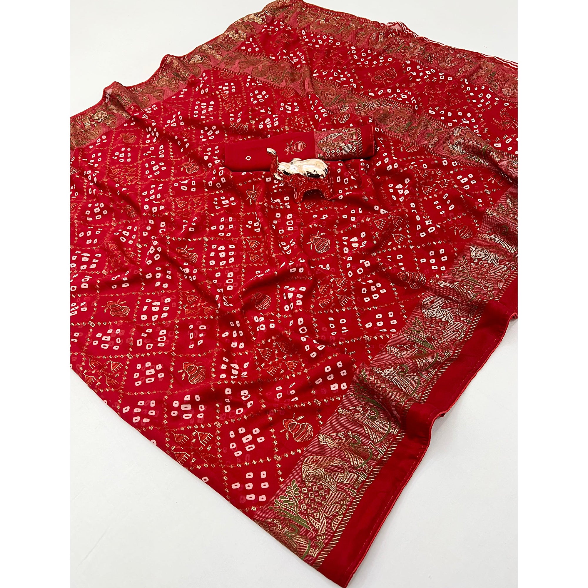 Elegant Red Bandhani Foil Printed Georgette Saree Highlighted With Soft Tassel Pallu