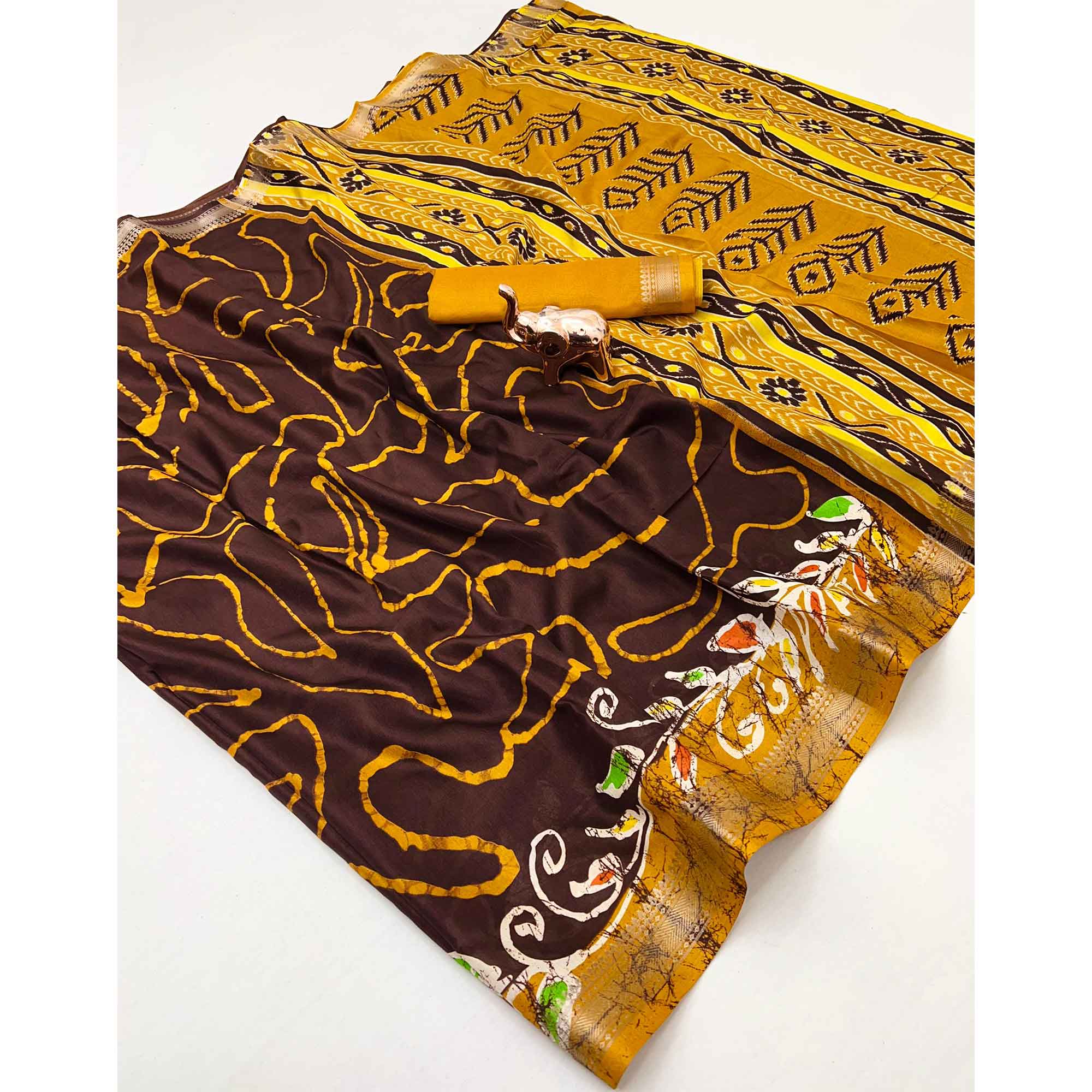 Majestic Brown Batik Abstract Printed Cotton Blend Saree With Elegant Zari Weaving Border