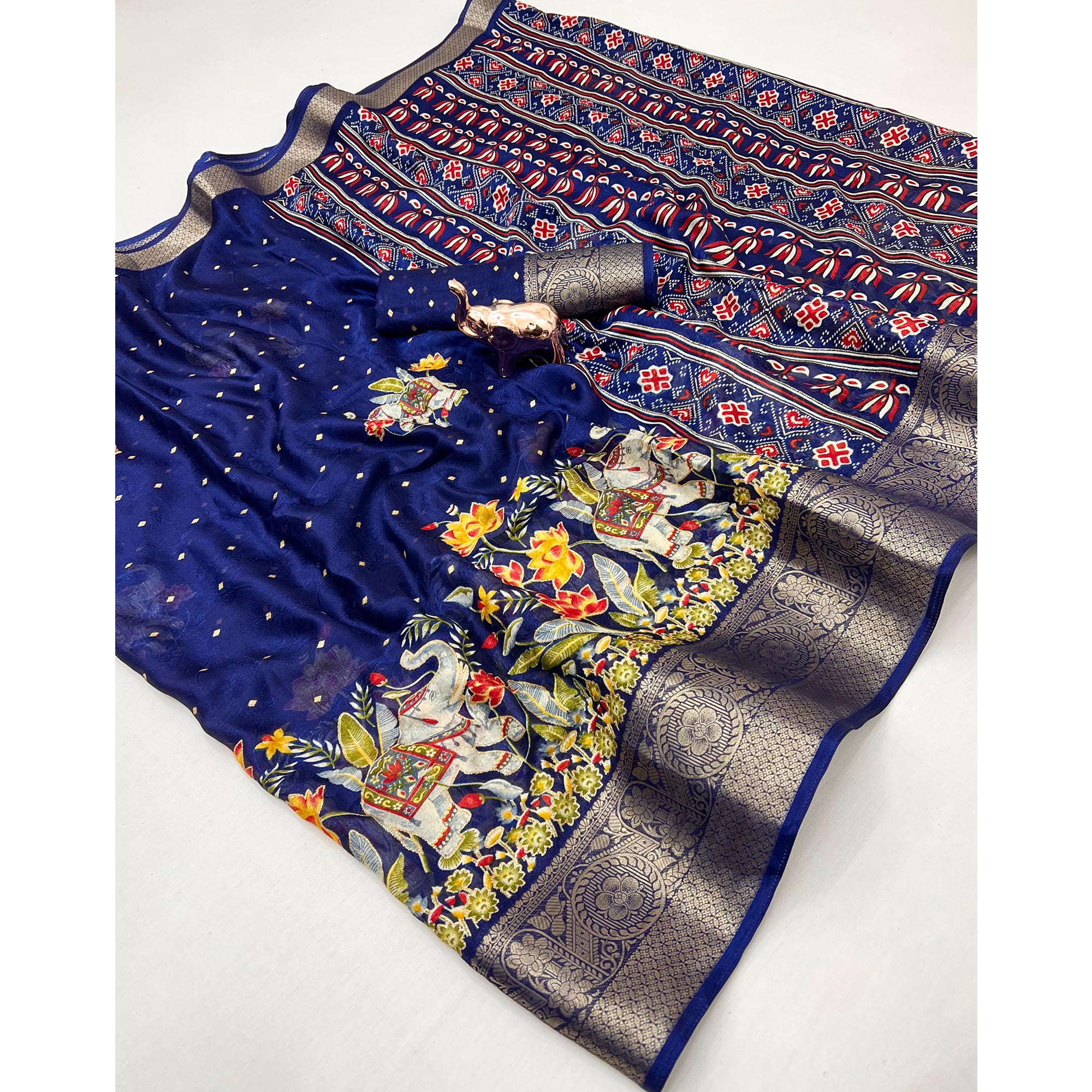 Elegant Navy Blue Elephant & Floral Printed Georgette Saree Accented With Weaving Zari Border