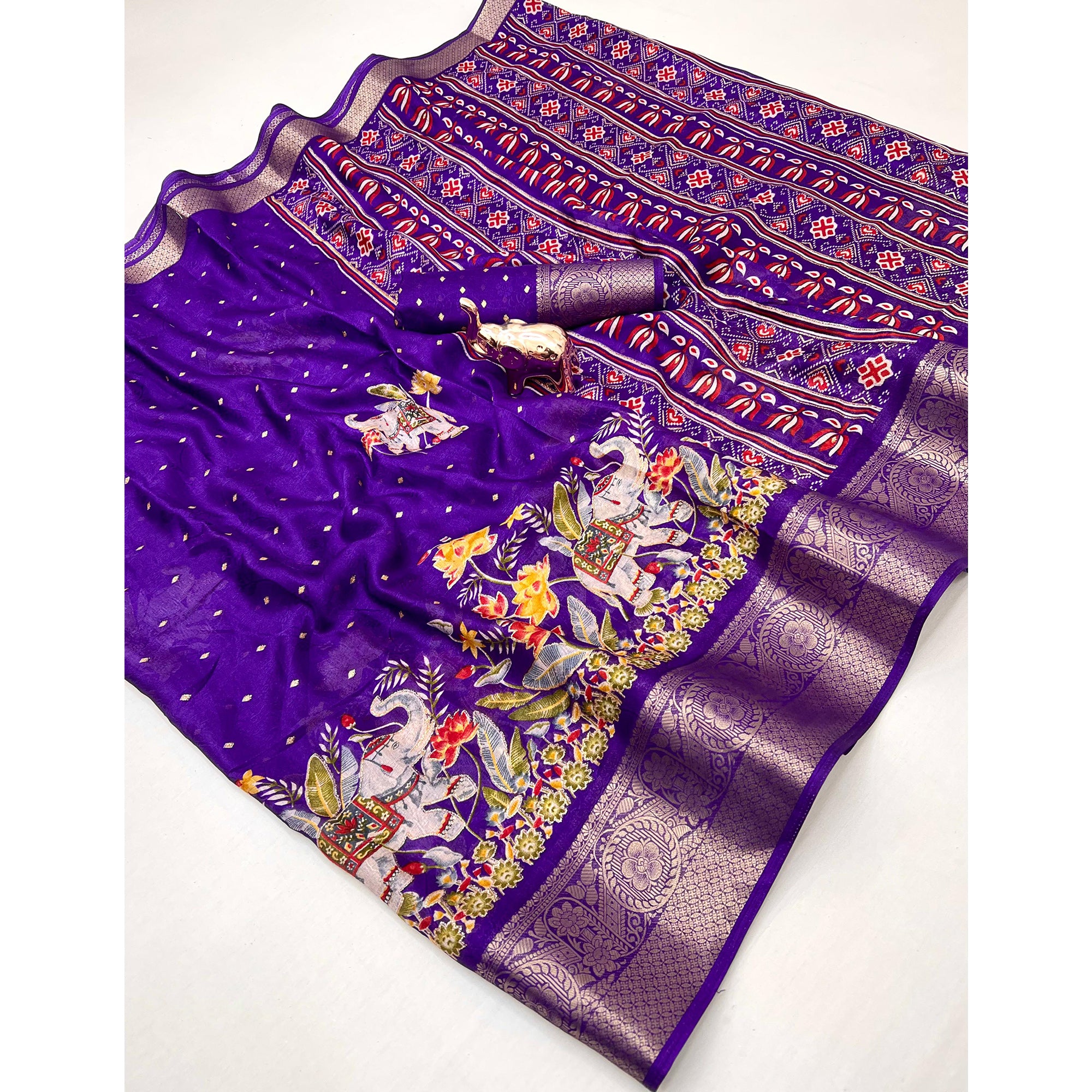Elegant Royal Purple Elephant & Floral Printed Georgette Saree Accented With Weaving Zari Border