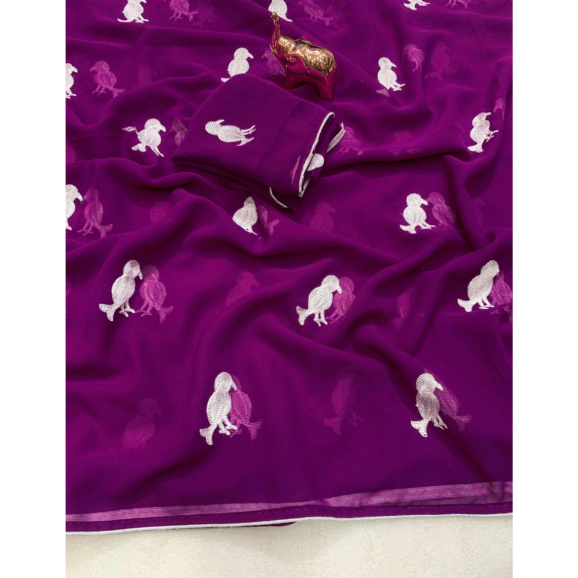 Dark Purple Georgette Saree Adorned With Elegant Bird Embroidery