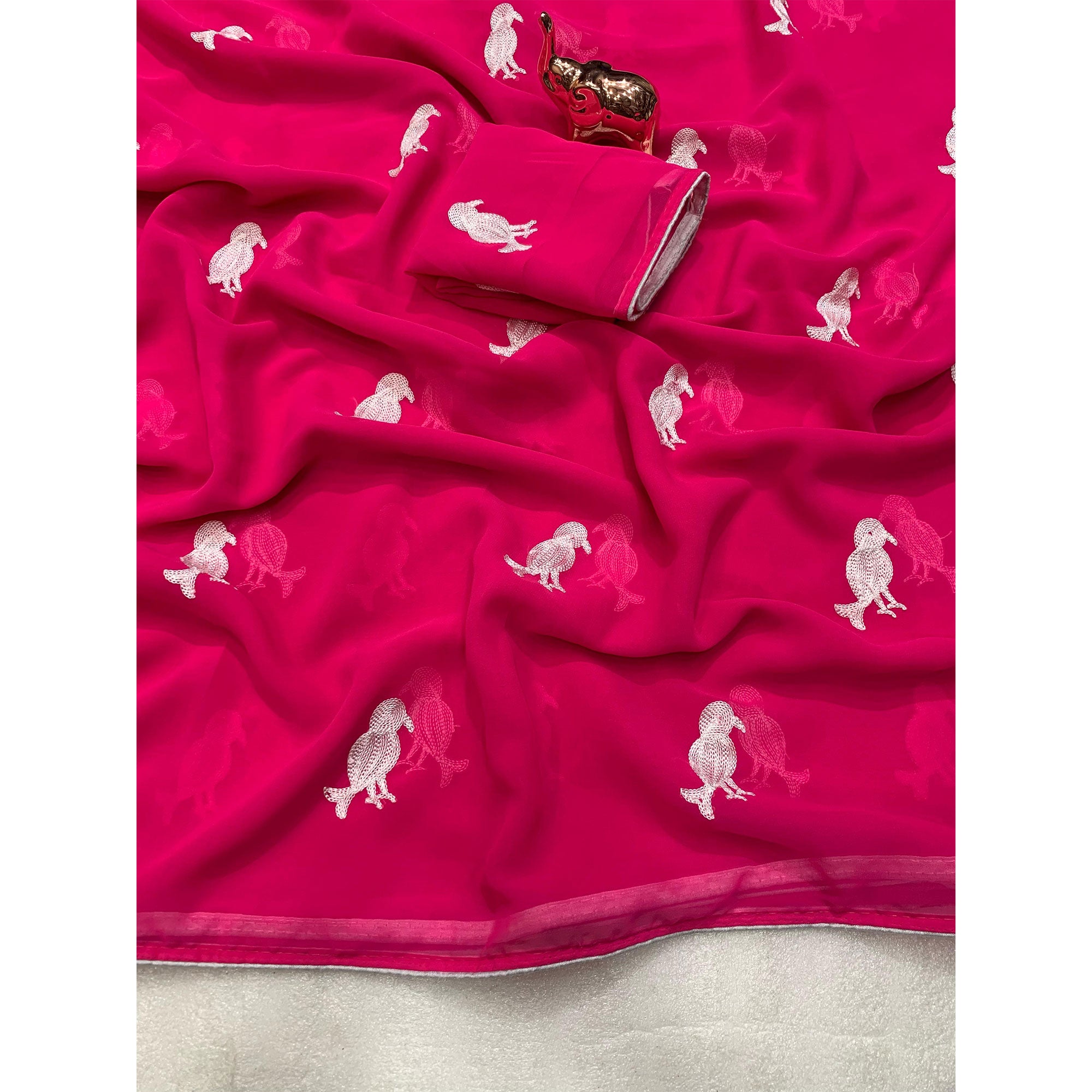 Pink Georgette Saree Adorned With Elegant Bird Embroidery