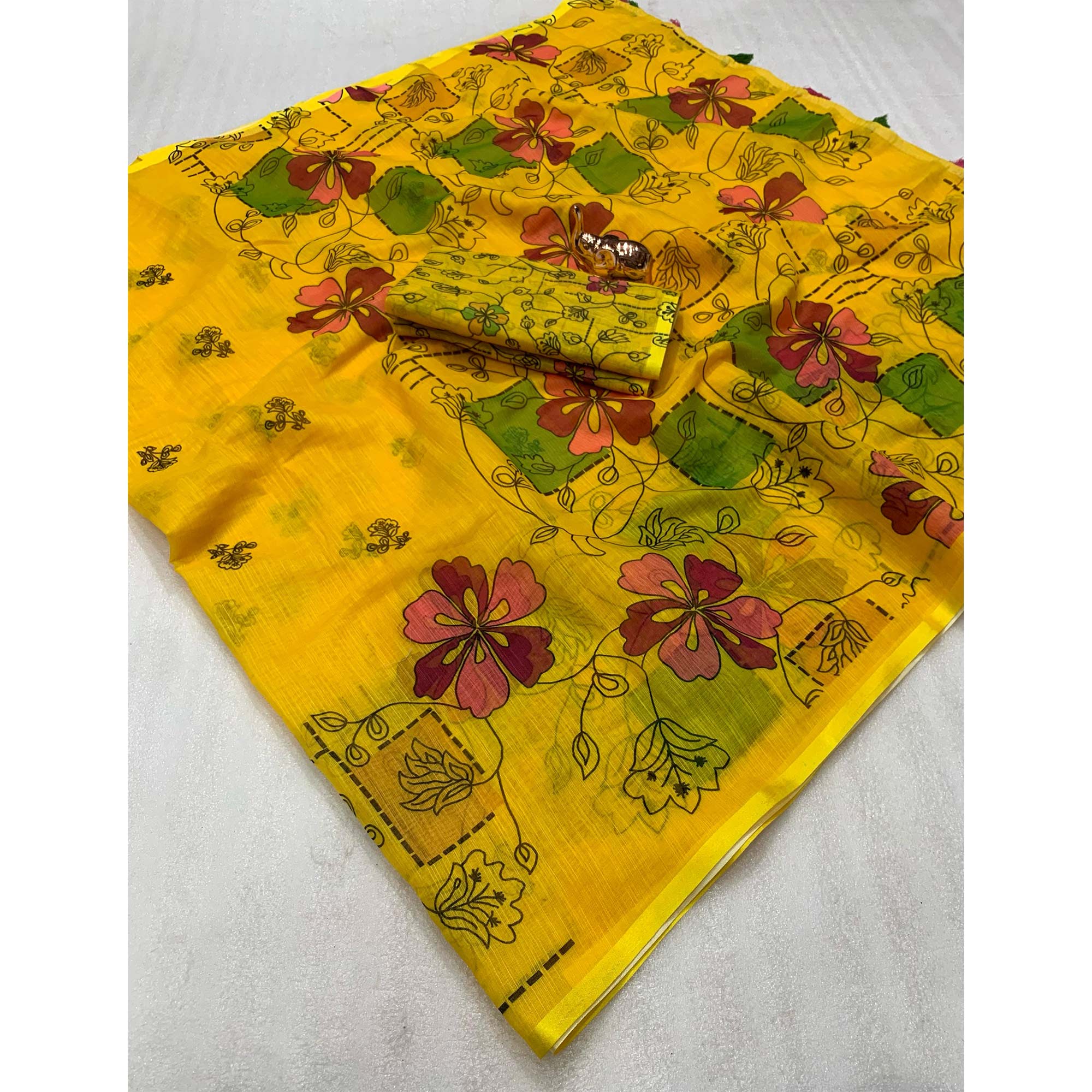 Mustard Floral Printed Linen Saree With Elegant Tassel Border