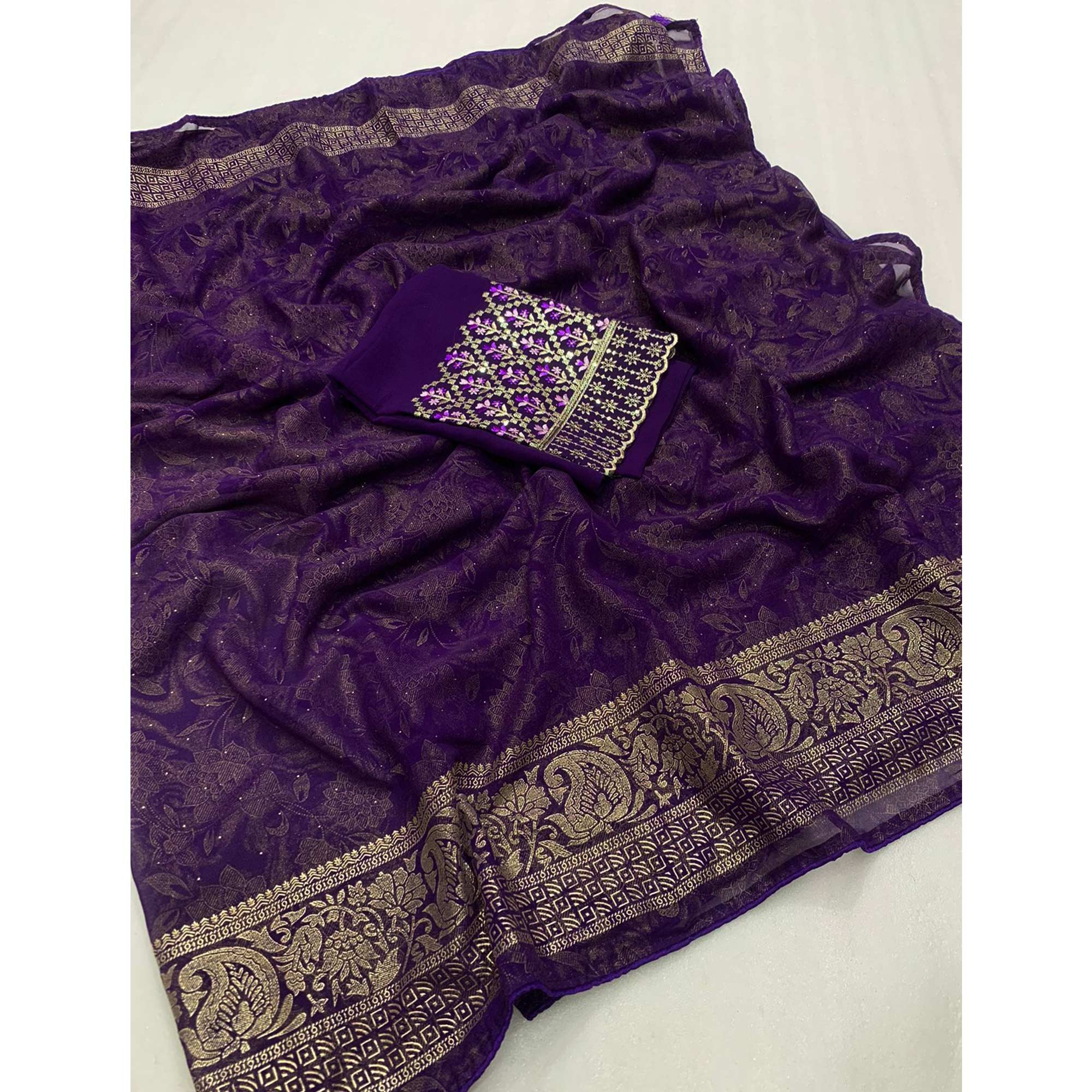 Purple Floral Foil Printed Georgette Saree With Tassels