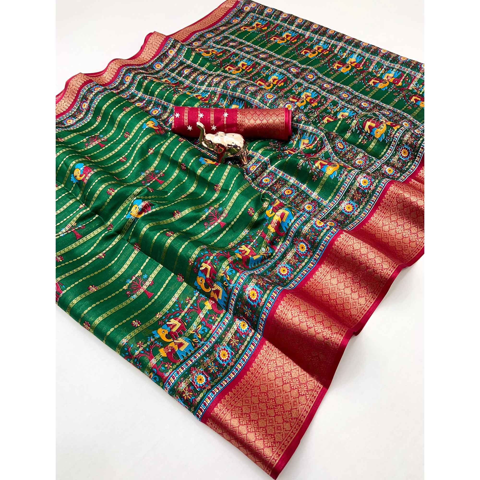 Regal Green Weaving Dola Silk Saree Adorned With Artistic Elephant & Floral Print