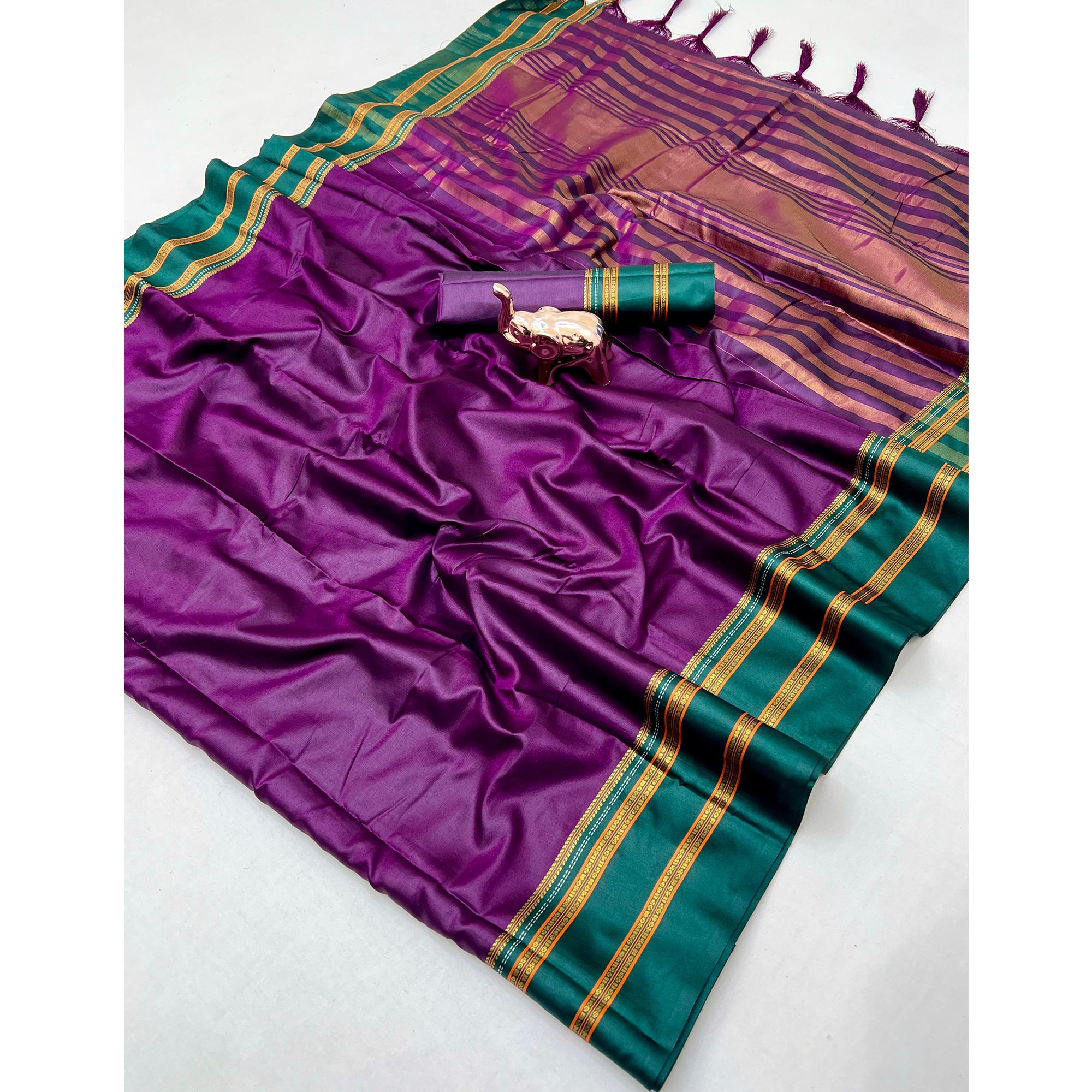 Classic Purple Solid Weaving Pure Silk Saree Accented With Woven Striped Pallu & Tassel Finish