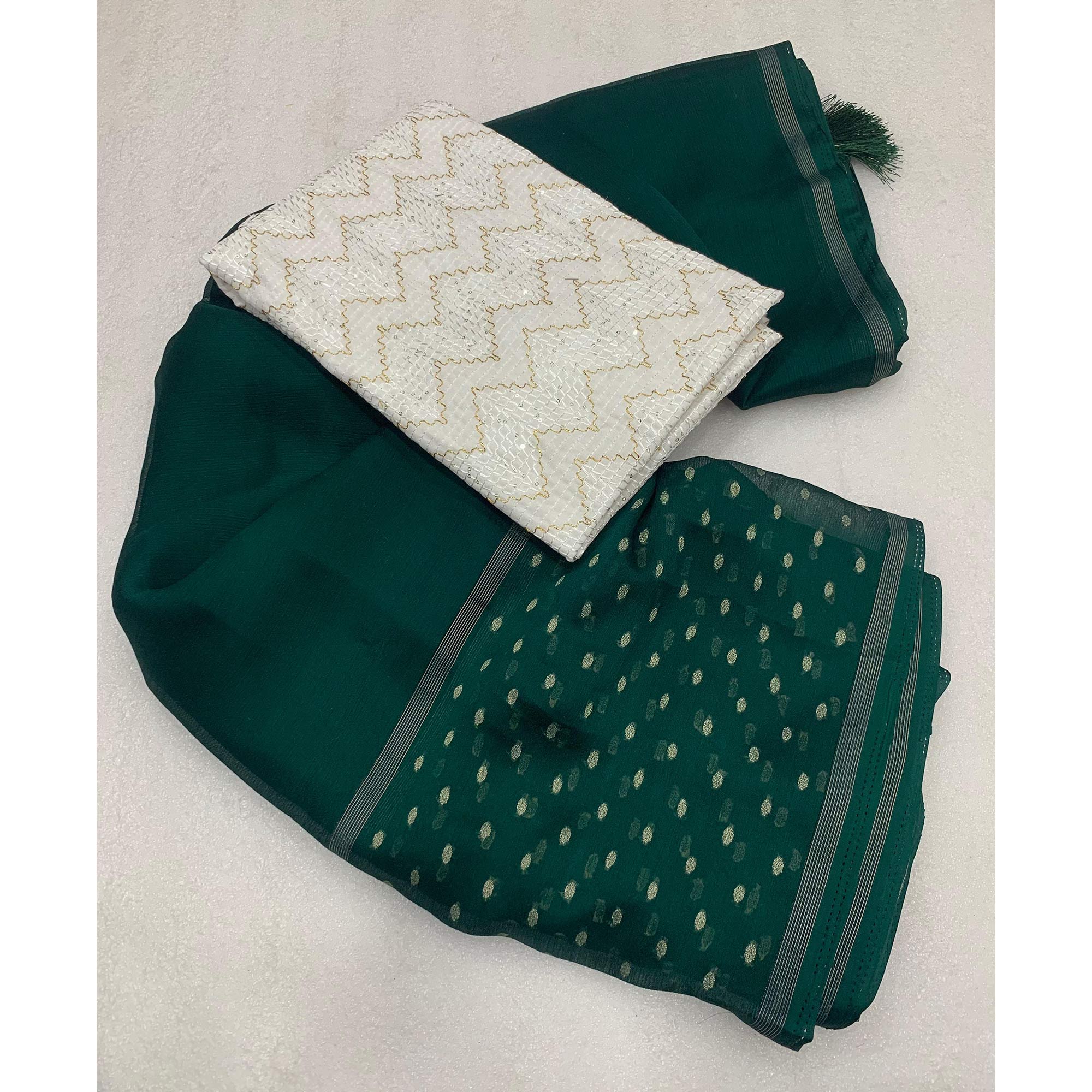Green Woven Georgette Saree With Tassels