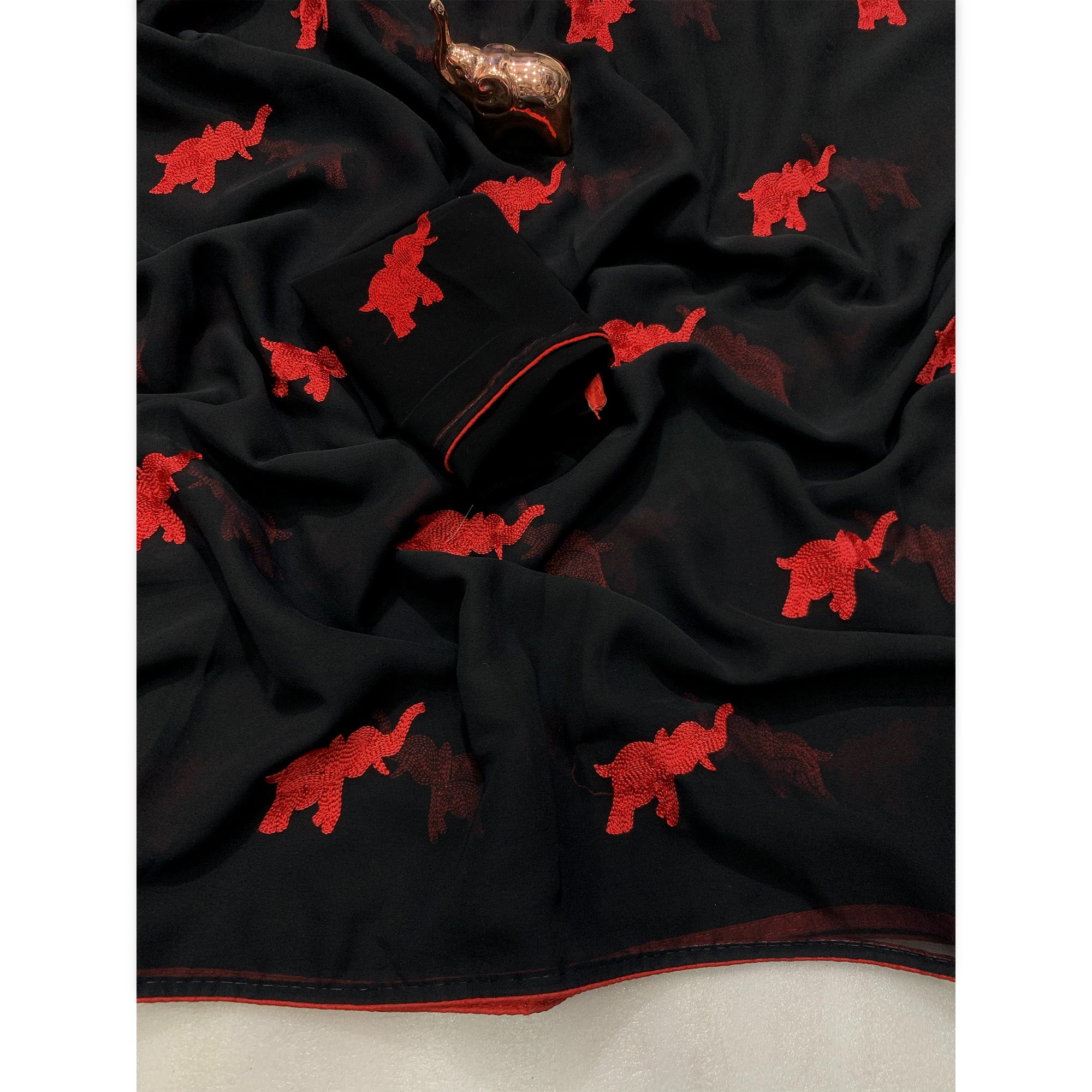 Black Georgette Saree Featuring Exquisite Elephant Embroidery