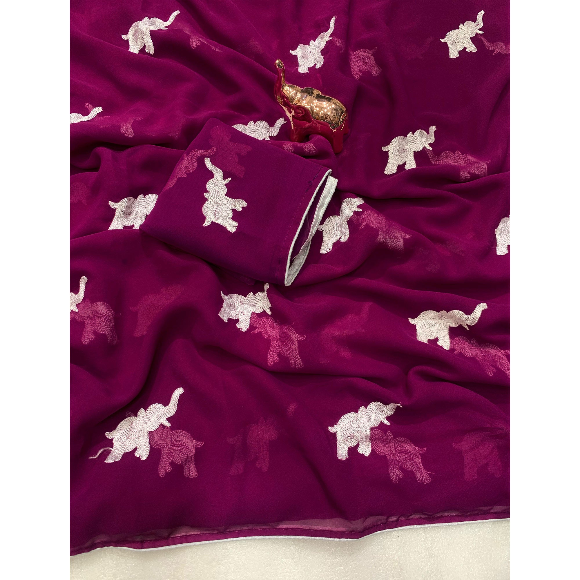 Dark Purple Georgette Saree Featuring Exquisite Elephant Embroidery
