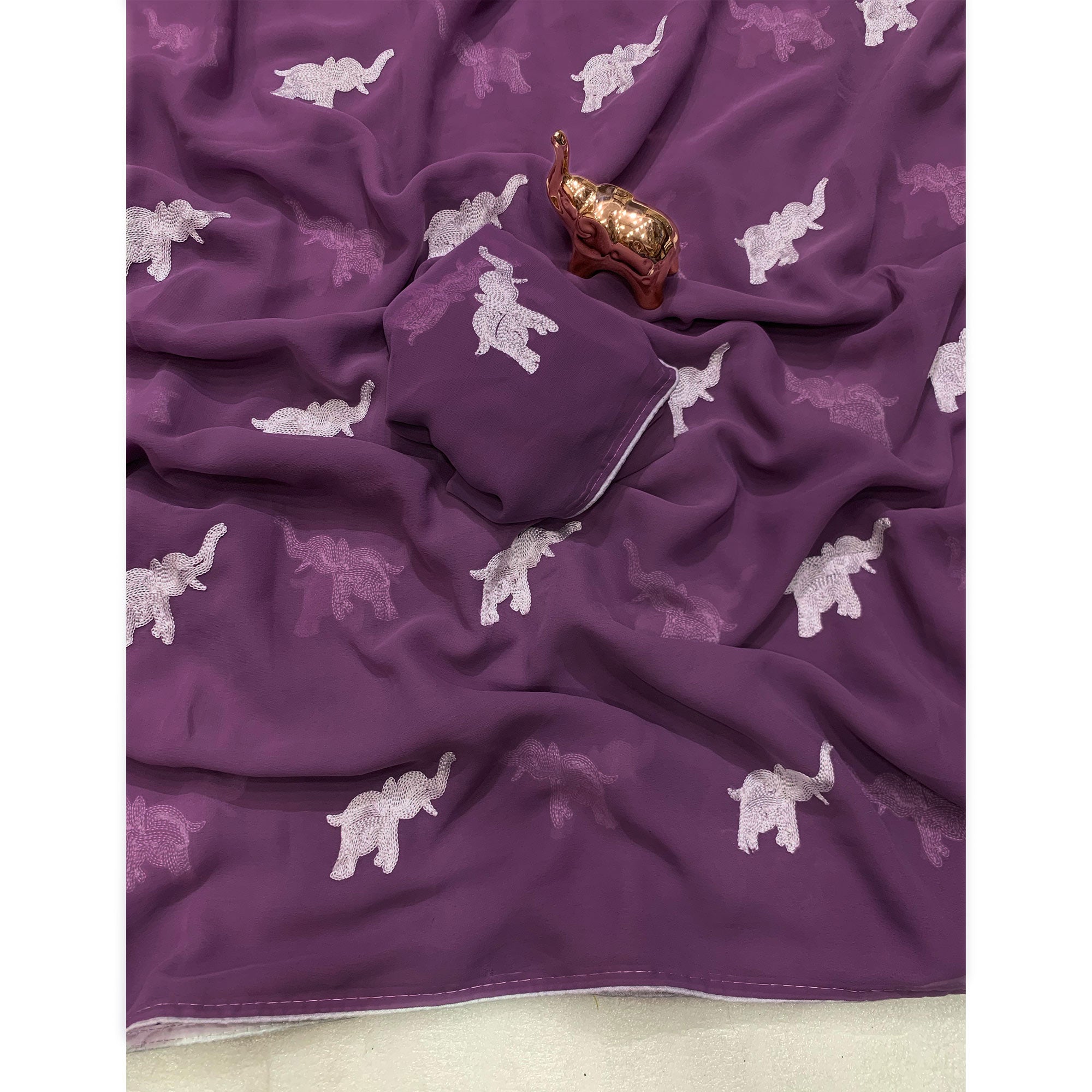 Light Purple Georgette Saree Featuring Exquisite Elephant Embroidery
