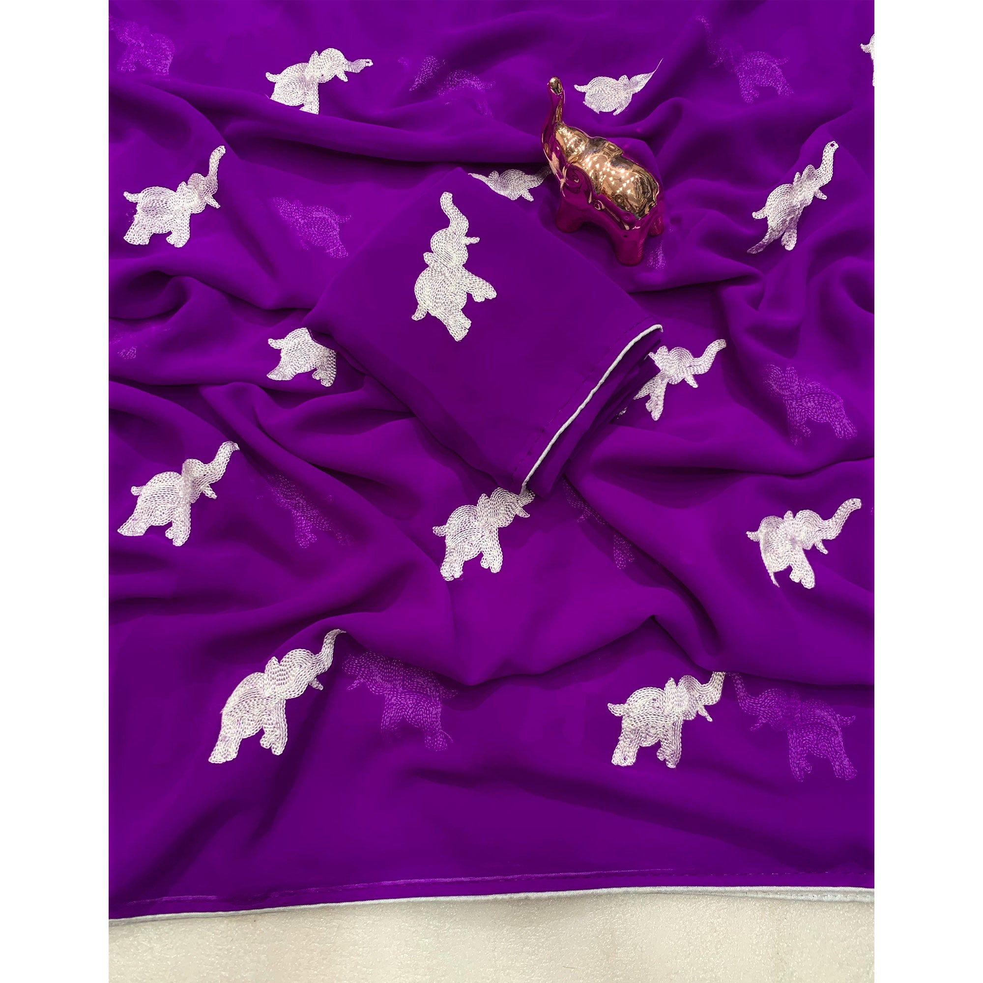 Purple Georgette Saree Featuring Exquisite Elephant Embroidery