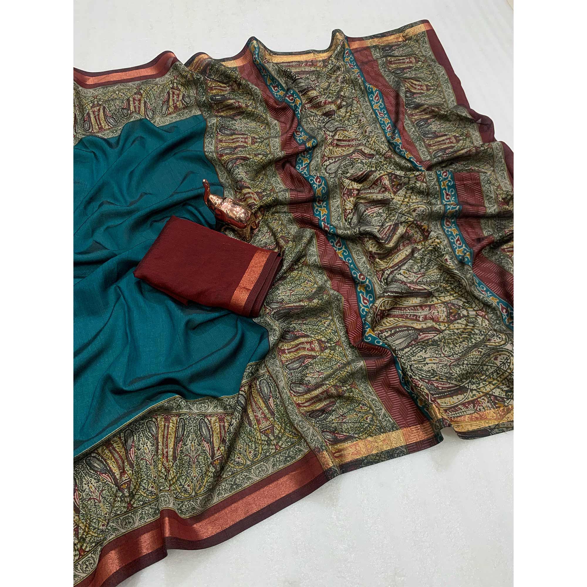 Teal Blue Solid Maheshwari Silk Blend Saree Adorned With Ajrakh Print & Two Tone Finish