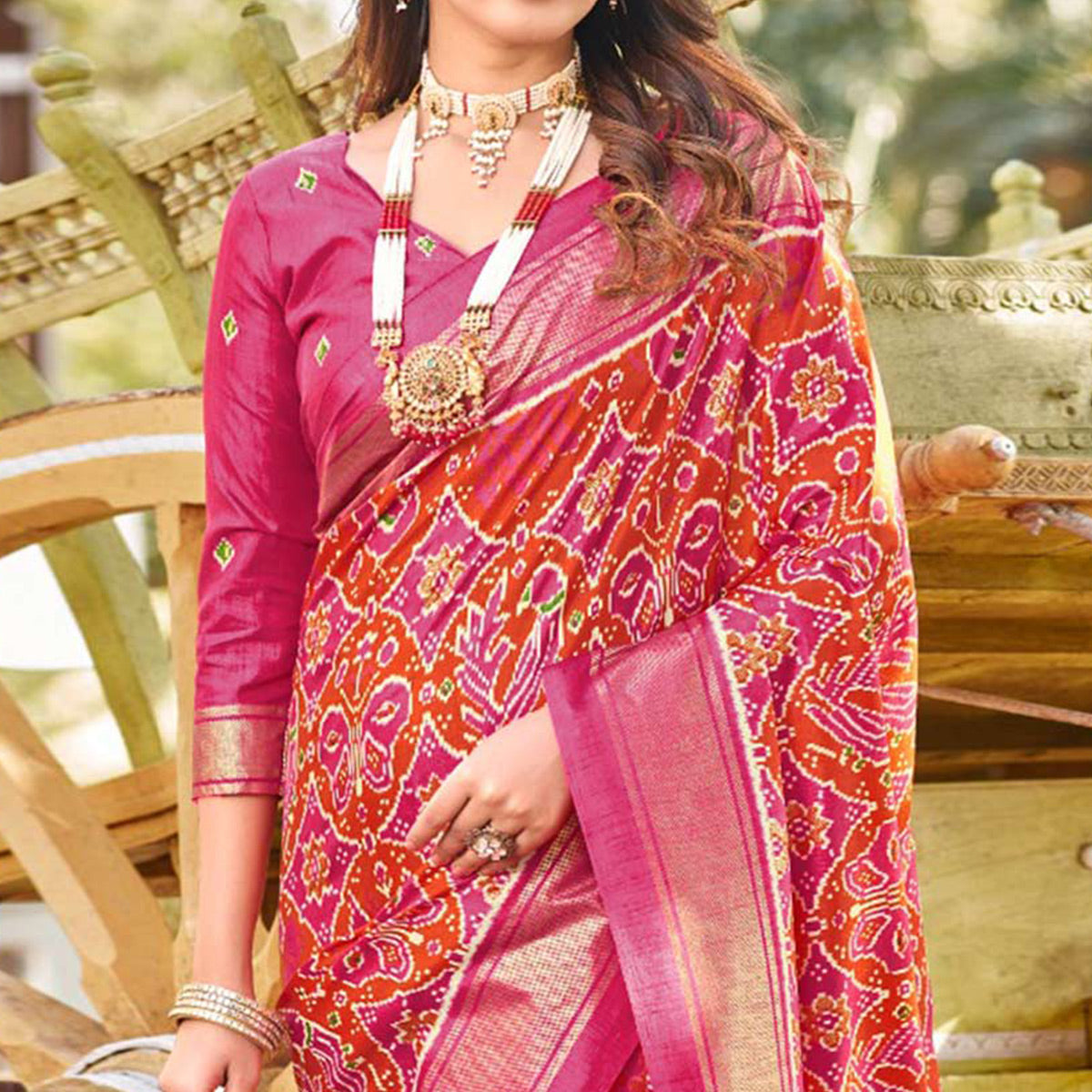 Pink & Orange Patola Printed Viscose Saree With Zari Border