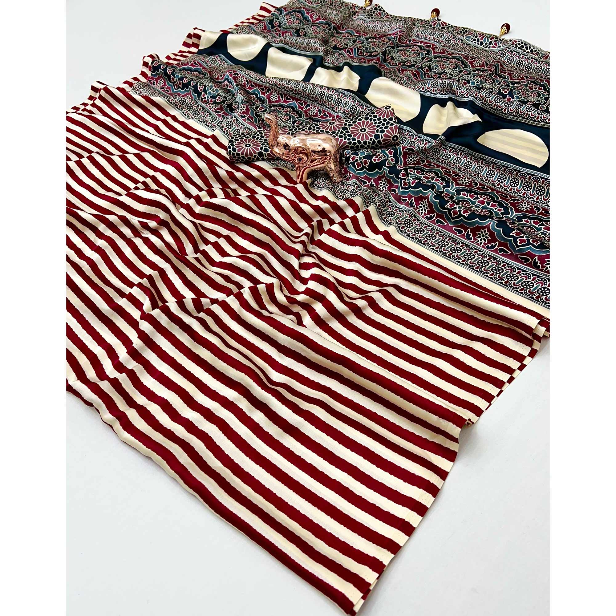 Luxe Partywear Saree in Maroon Satin with Modern Striped Print and Flowing Drape