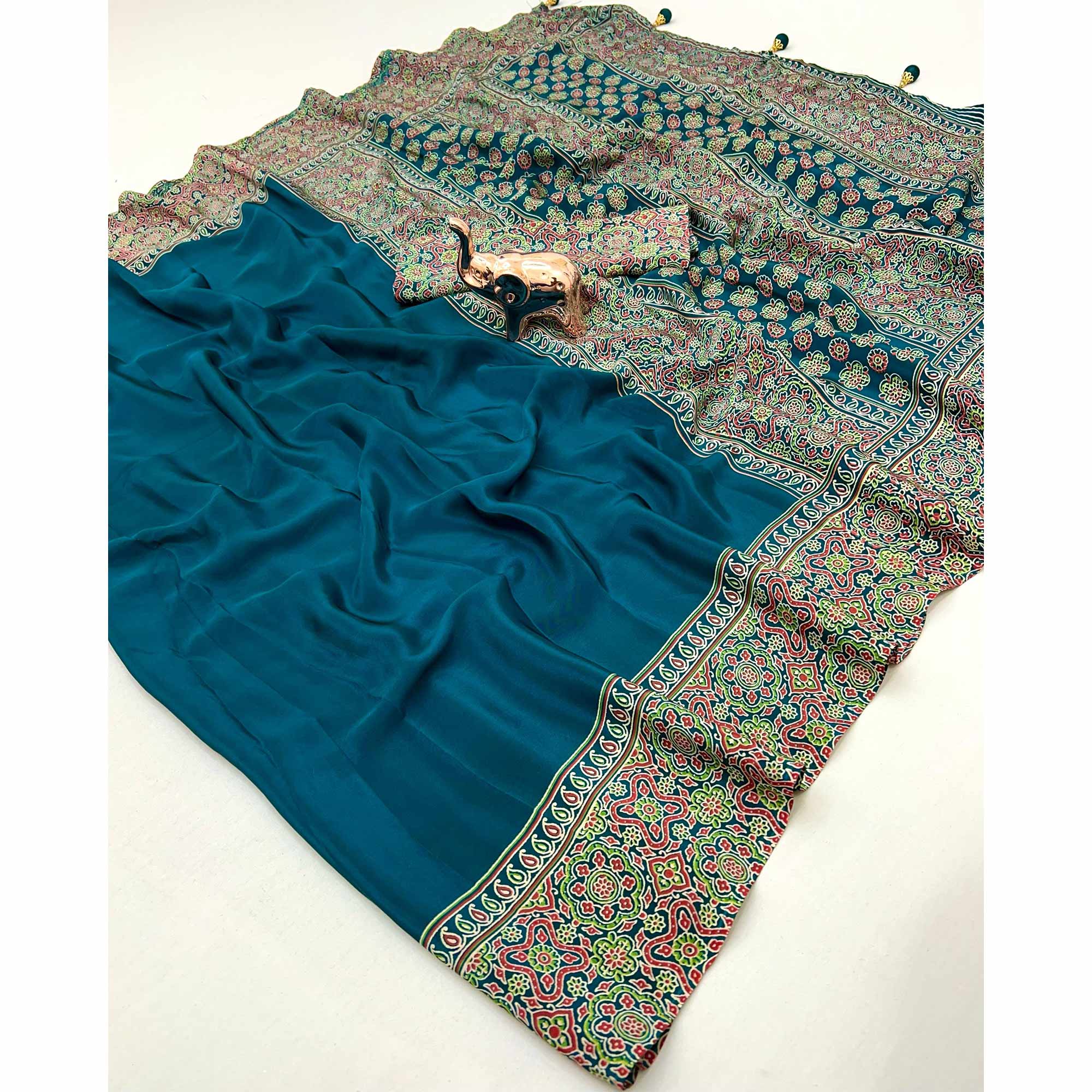 Teal Satin Saree Showcasing Rich Ajrakh Printed Design & Tassel Finished Pallu