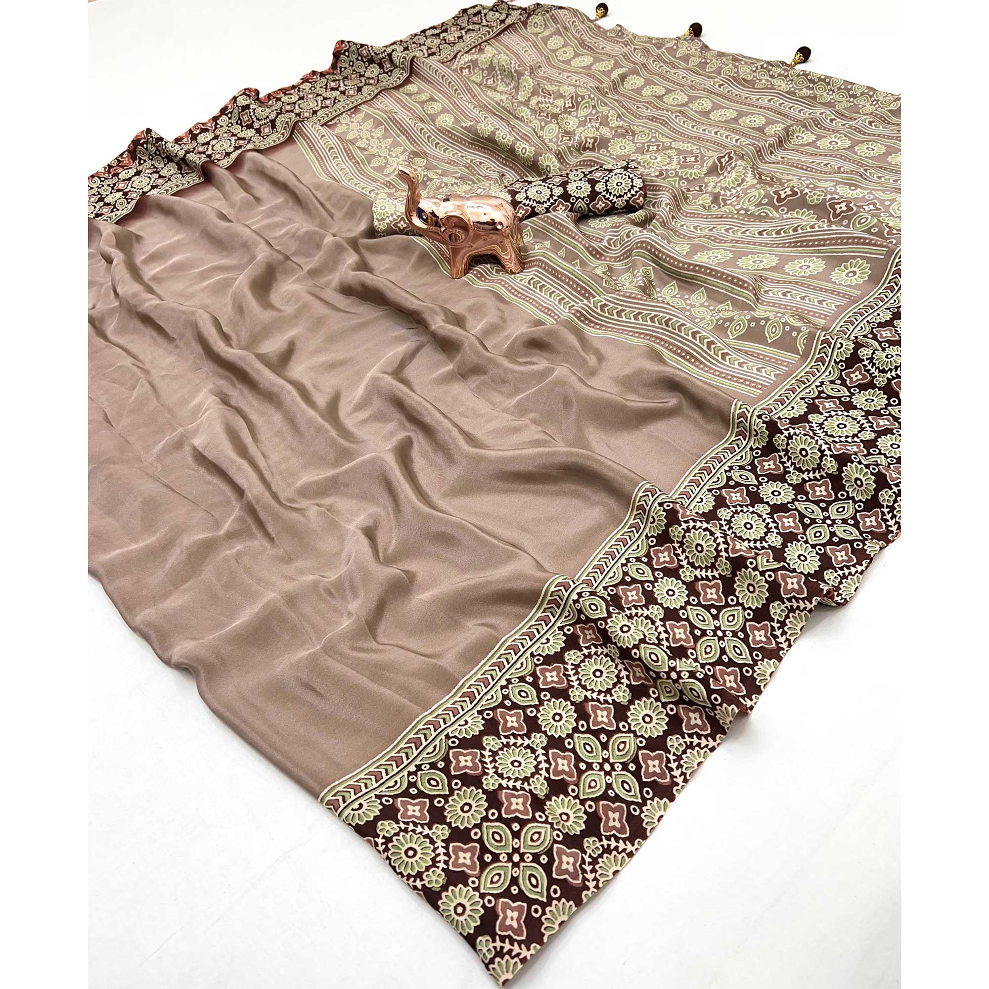 Taupe Solid Satin Saree Featuring Bold Ajrakh Print and Tassel Accented Pallu