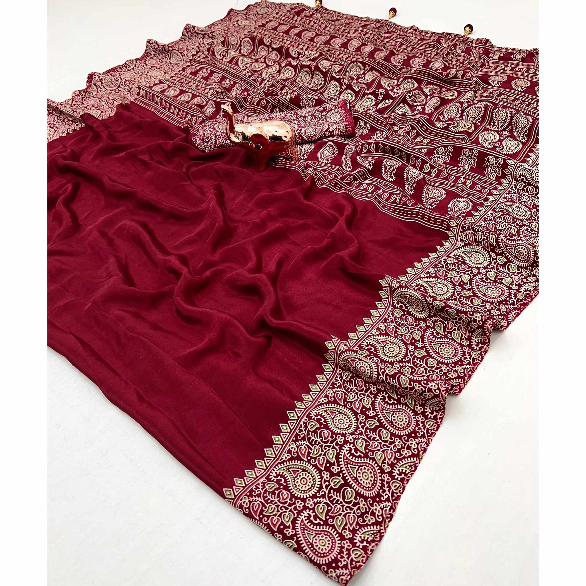 Maroon Satin Saree In Ajrakh Floral Print With Tassel Adorned Pallu