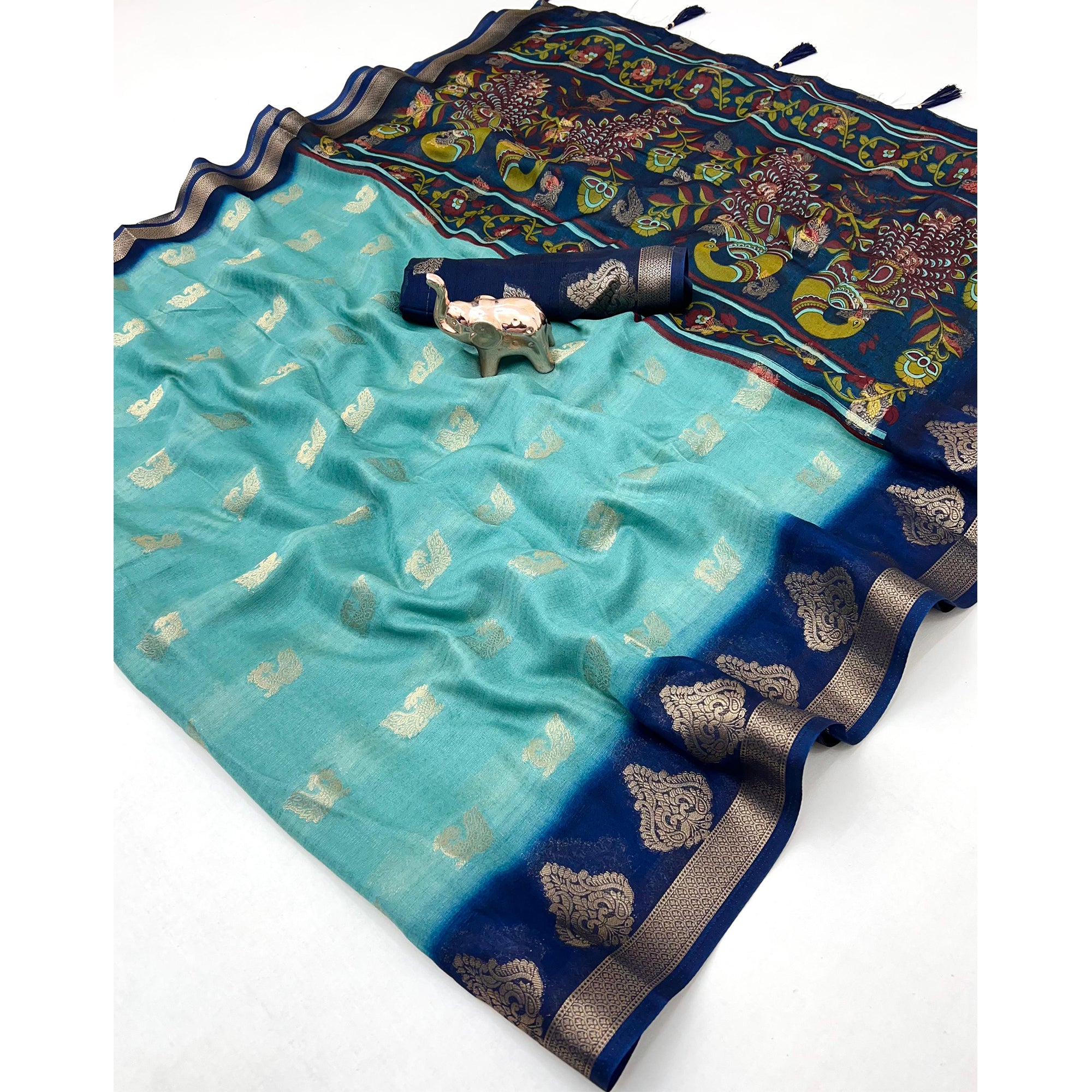 Elegant Blue Peacock Pattern Zari Weaving Georgette Saree With Tassel Pallu