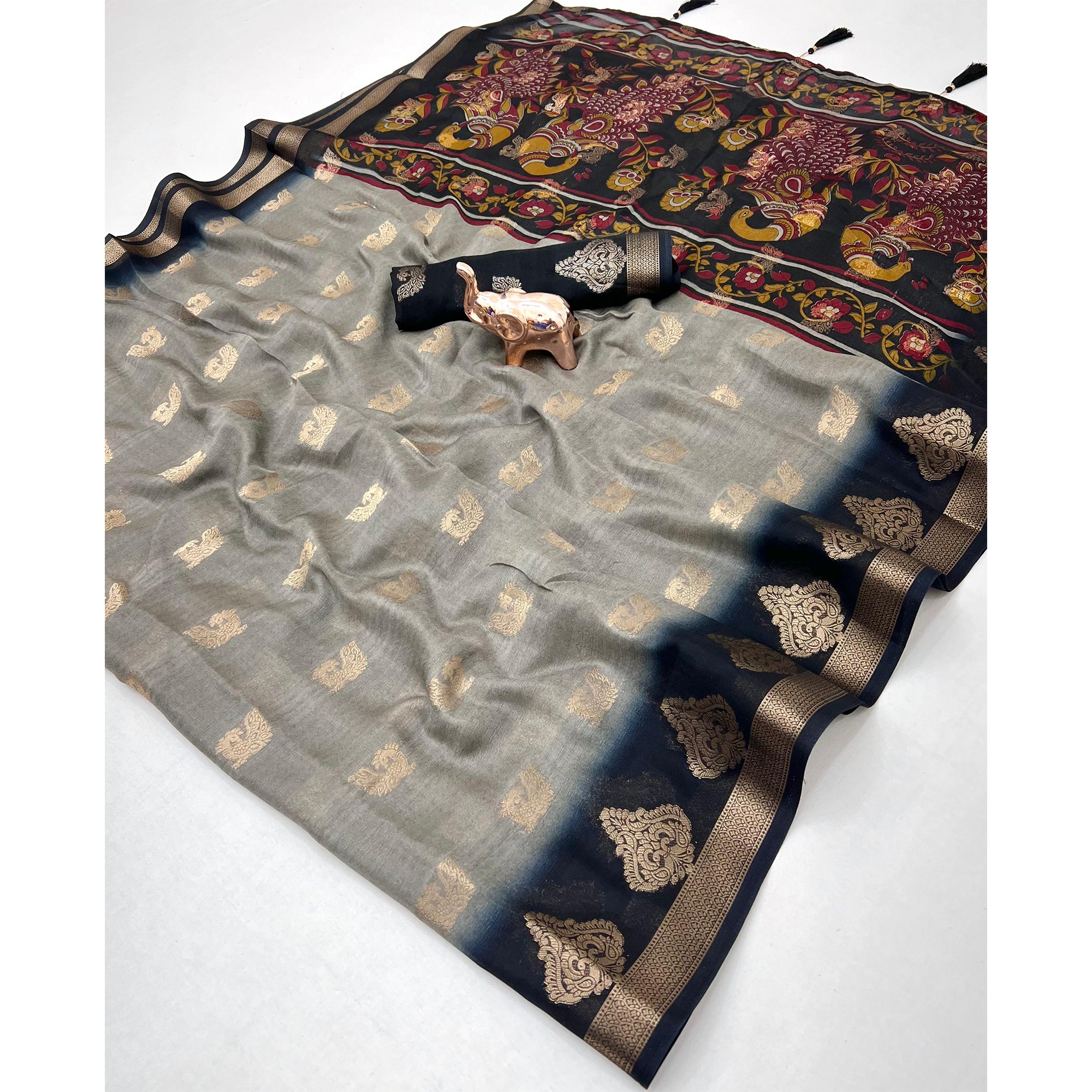 Elegant Grey Peacock Pattern Zari Weaving Georgette Saree With Tassel Pallu