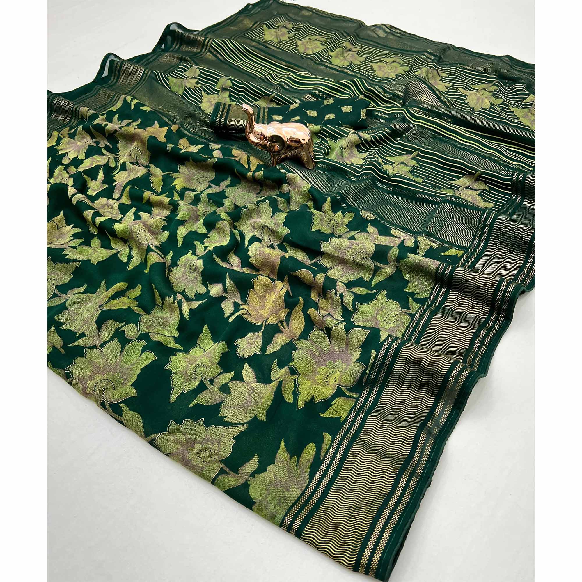 Green Floral Foil Printed Georgette Saree With Tassels