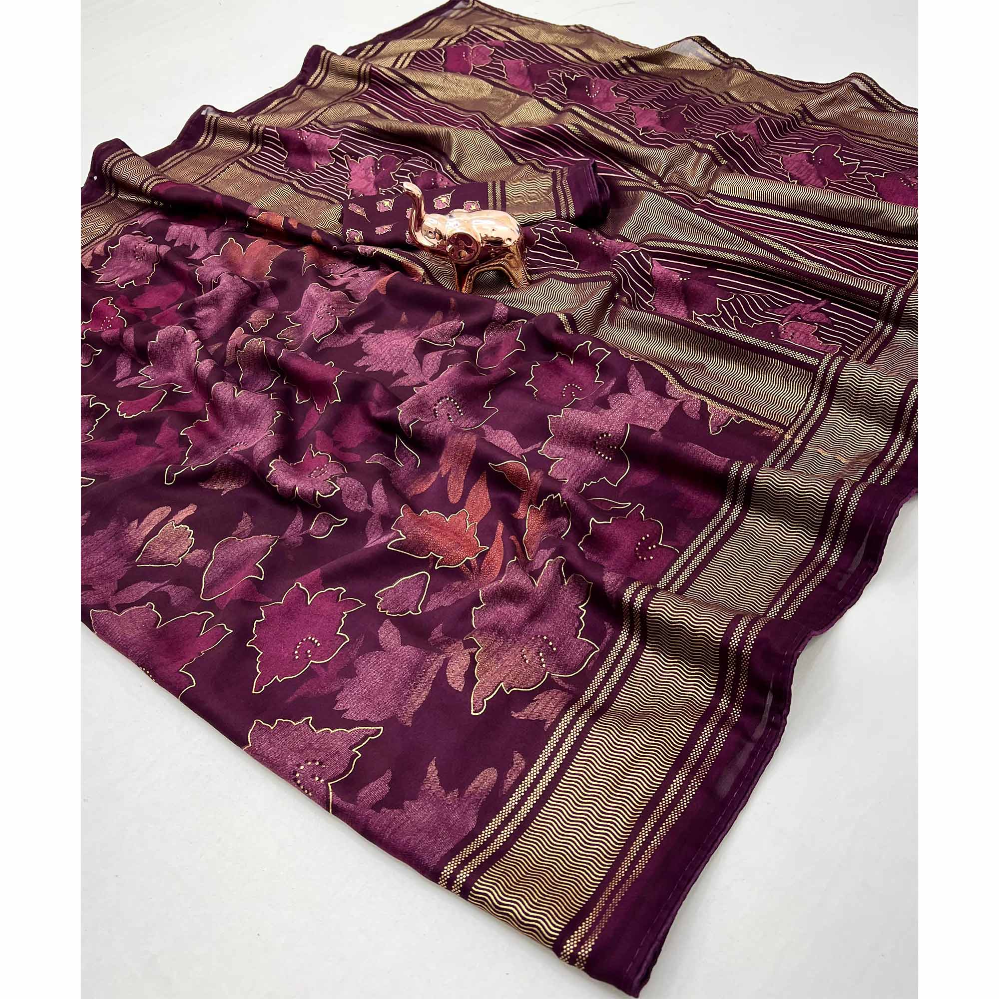 Wine Floral Foil Printed Georgette Saree With Tassels