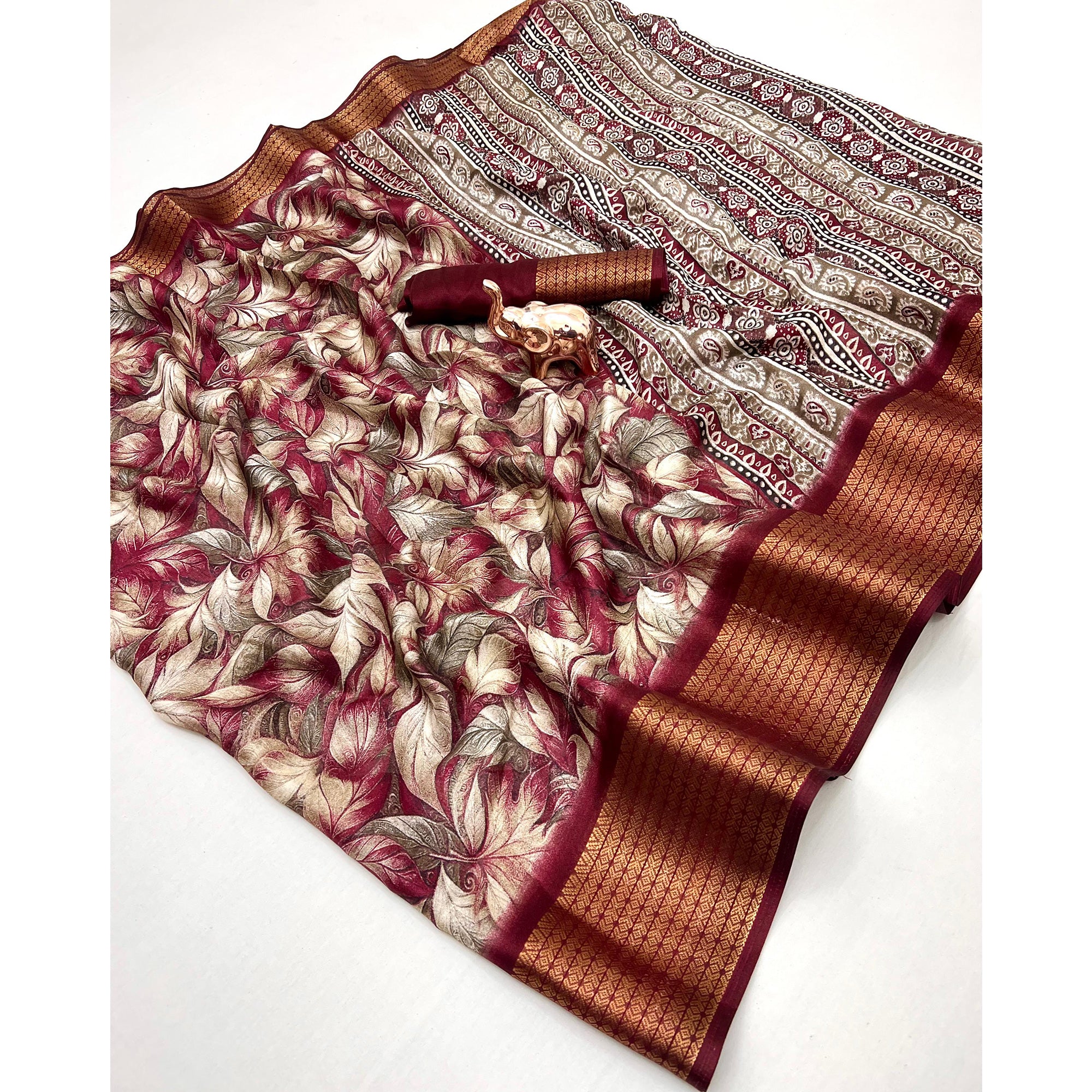Maroon Leaf Printed Dola Silk Marshmallow Saree With Paisley Jaal Pallu & Lustrous Weaving Border