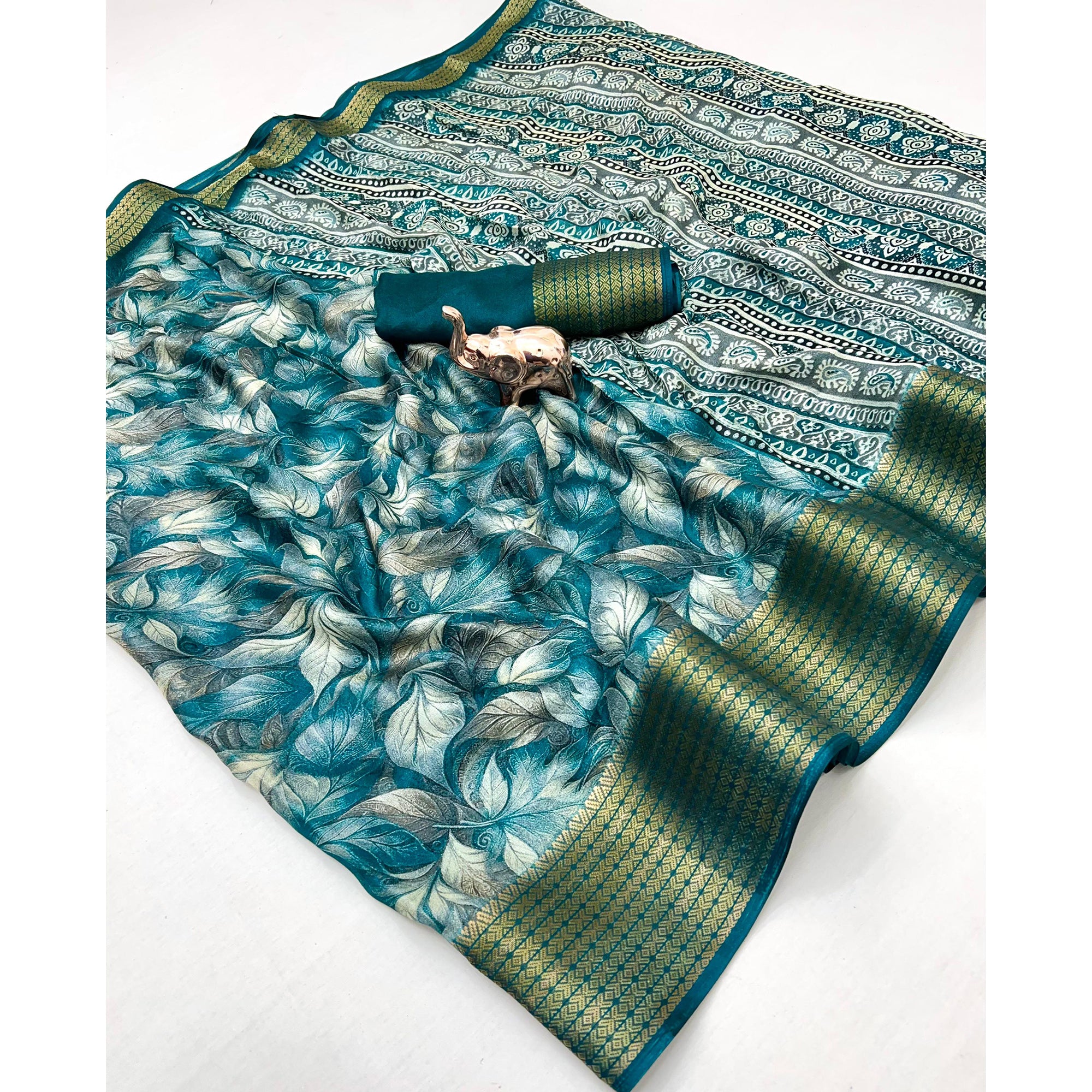 Teal Leaf Printed Dola Silk Marshmallow Saree With Paisley Jaal Pallu & Lustrous Weaving Border