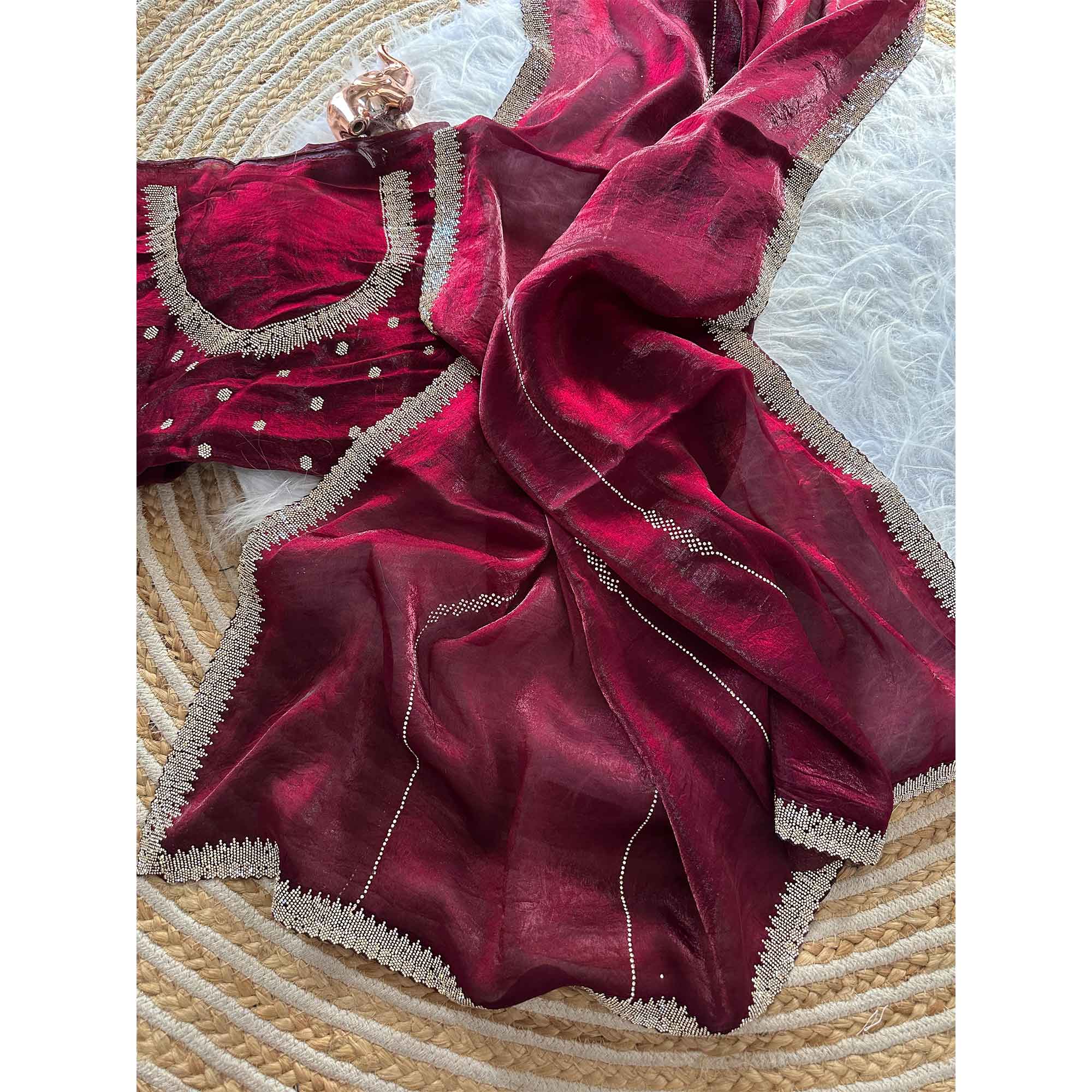 Classic Wine Pure Silk Saree Adorned With Sparkling Jarkan Work & An Exquisite Designer Border