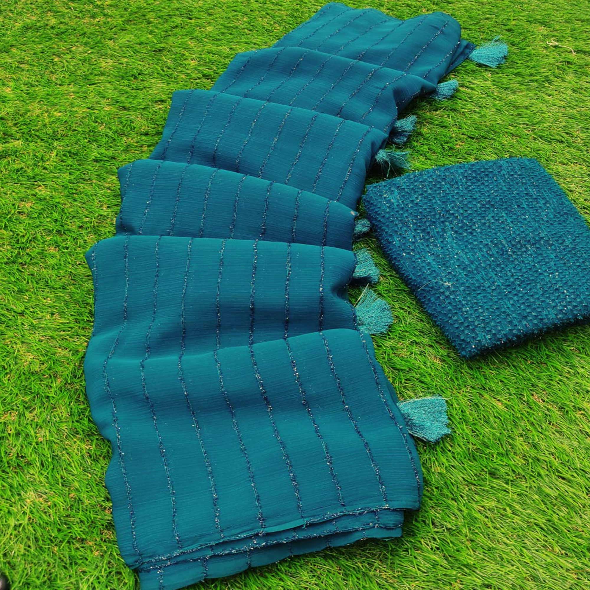 Teal Woven Chiffon Saree with Tassels
