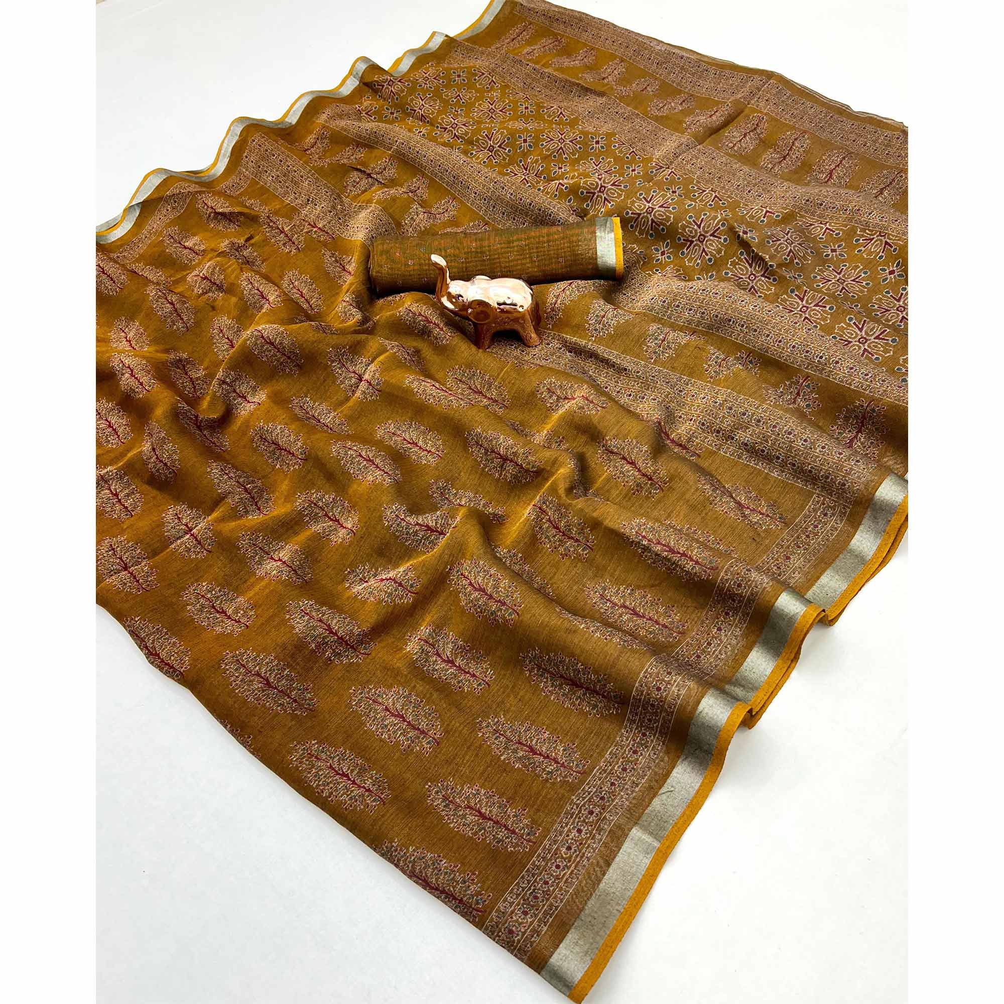 Classic Mustard Linen Cotton Saree Featuring Floral Ajrakh Print & Rich Silver Zari Border