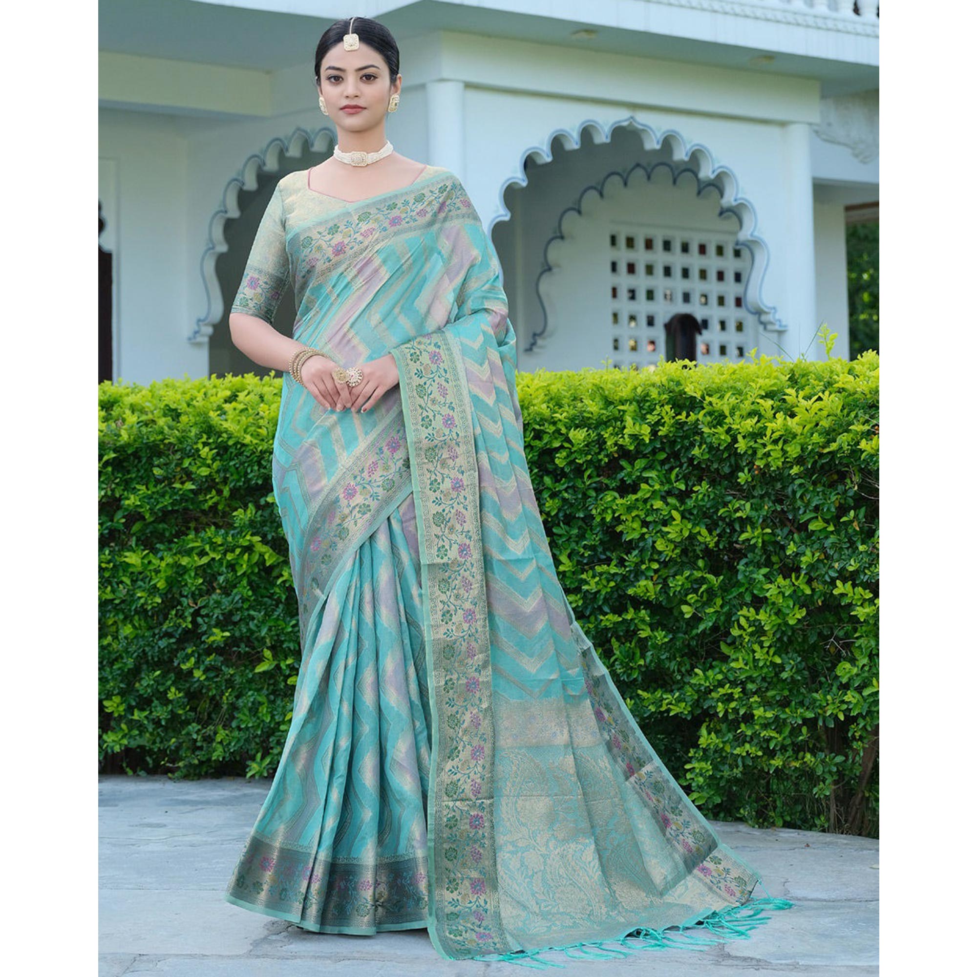 Blue Woven Organza Saree With Tassels