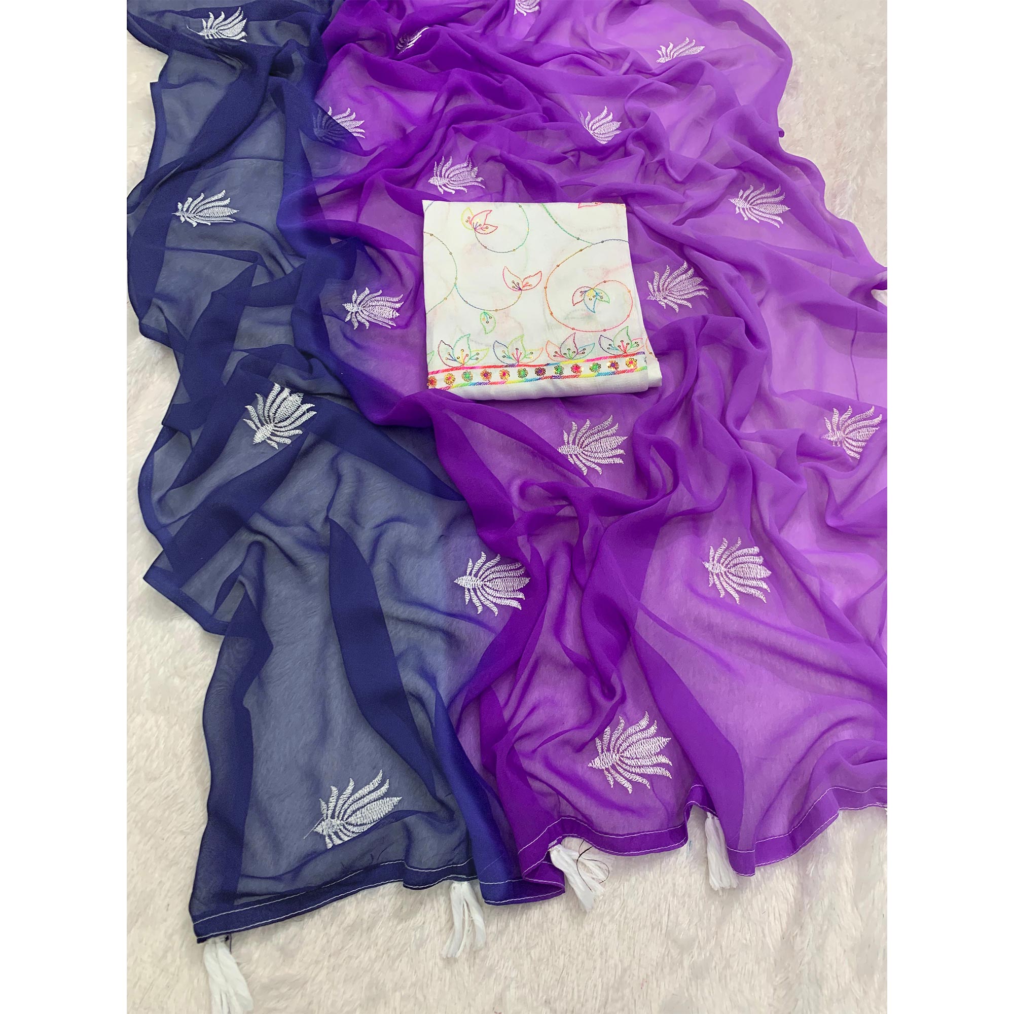 Purple & Blue Floral Embroidered Georgette Saree With Tassels