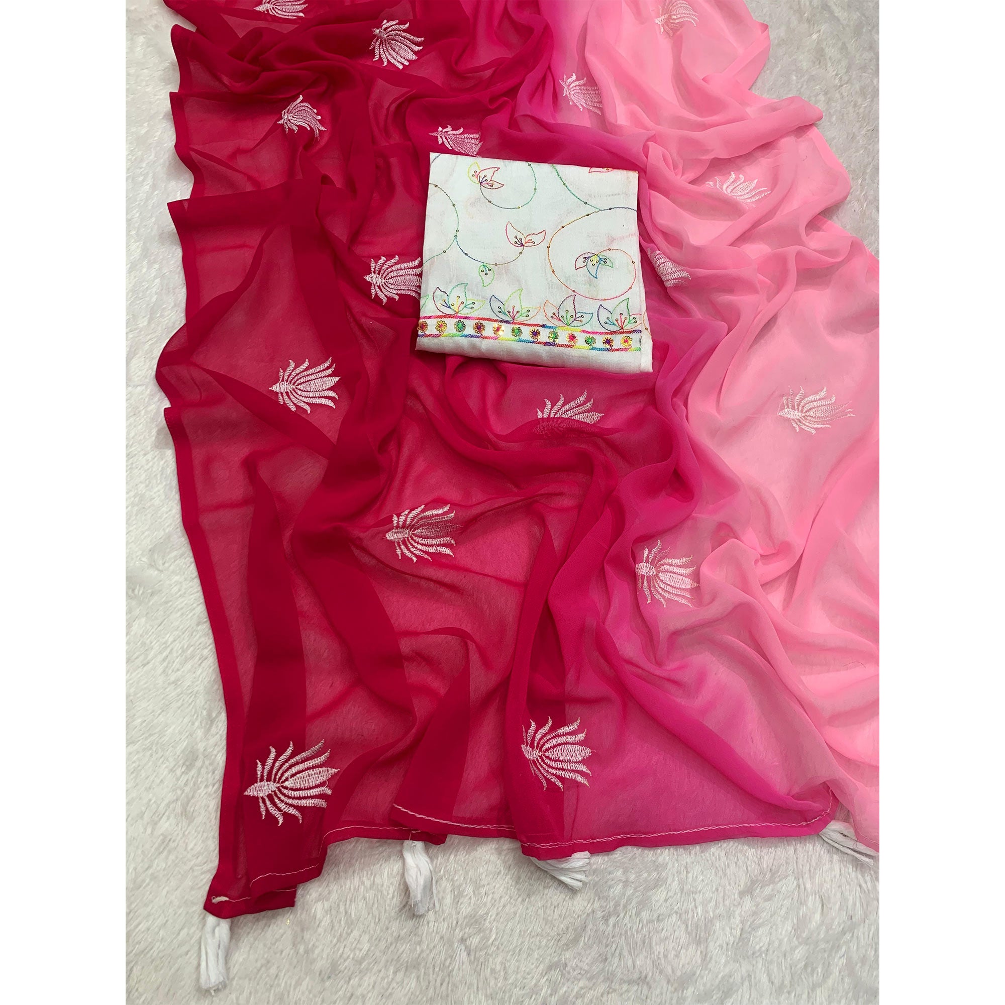 Rani Pink Floral Embroidered Georgette Saree With Tassels
