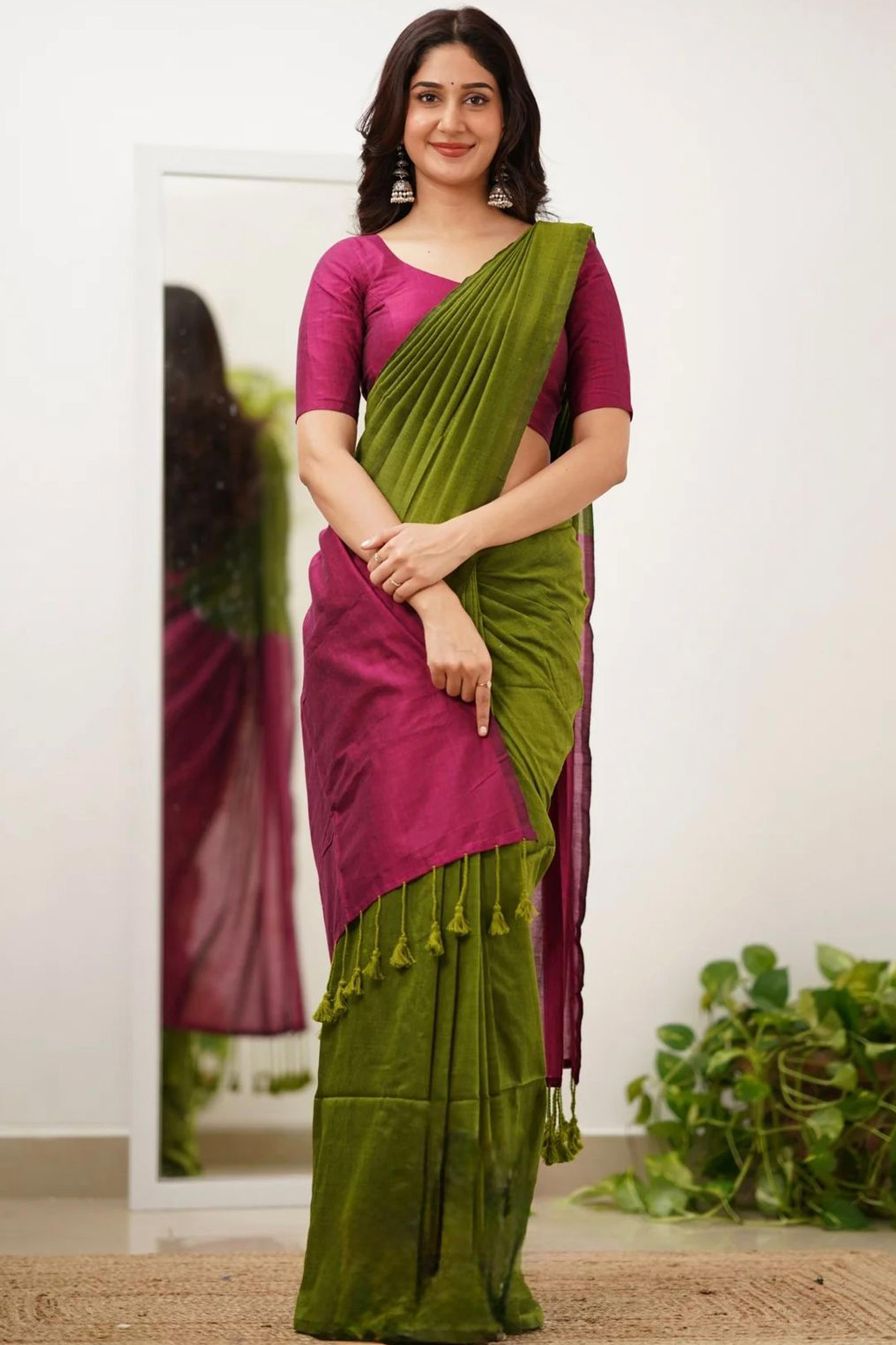 Charming Green & Magenta Solid Handwoven Pure Mul Cotton Saree With Tassel Pallu