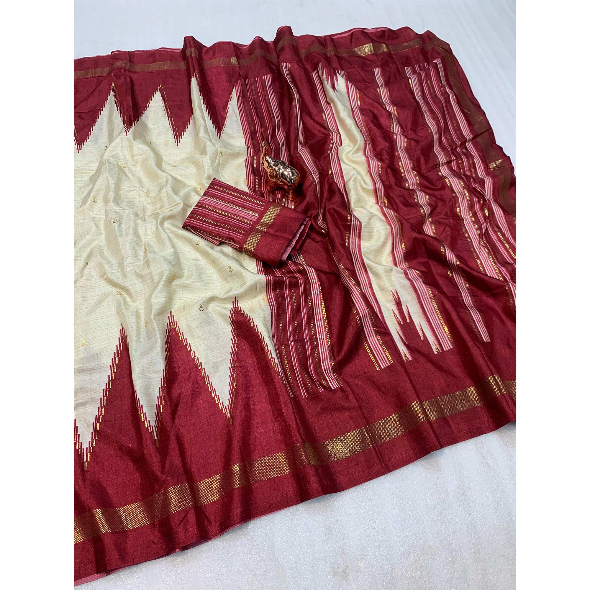Subtle & Stylish Cream Saree With Ikkat Prints In Luxe Dola Silk For Festive Wear