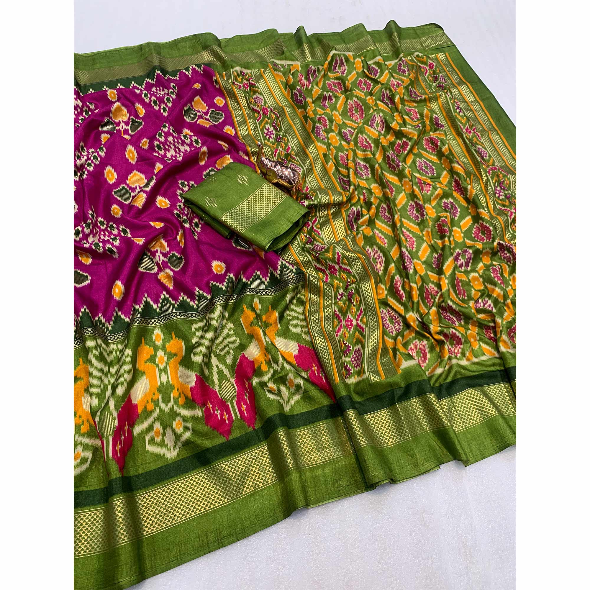 Subtle and Stylish Pink Saree with Ikkat Prints in Luxe Dola Silk for Festive Wear