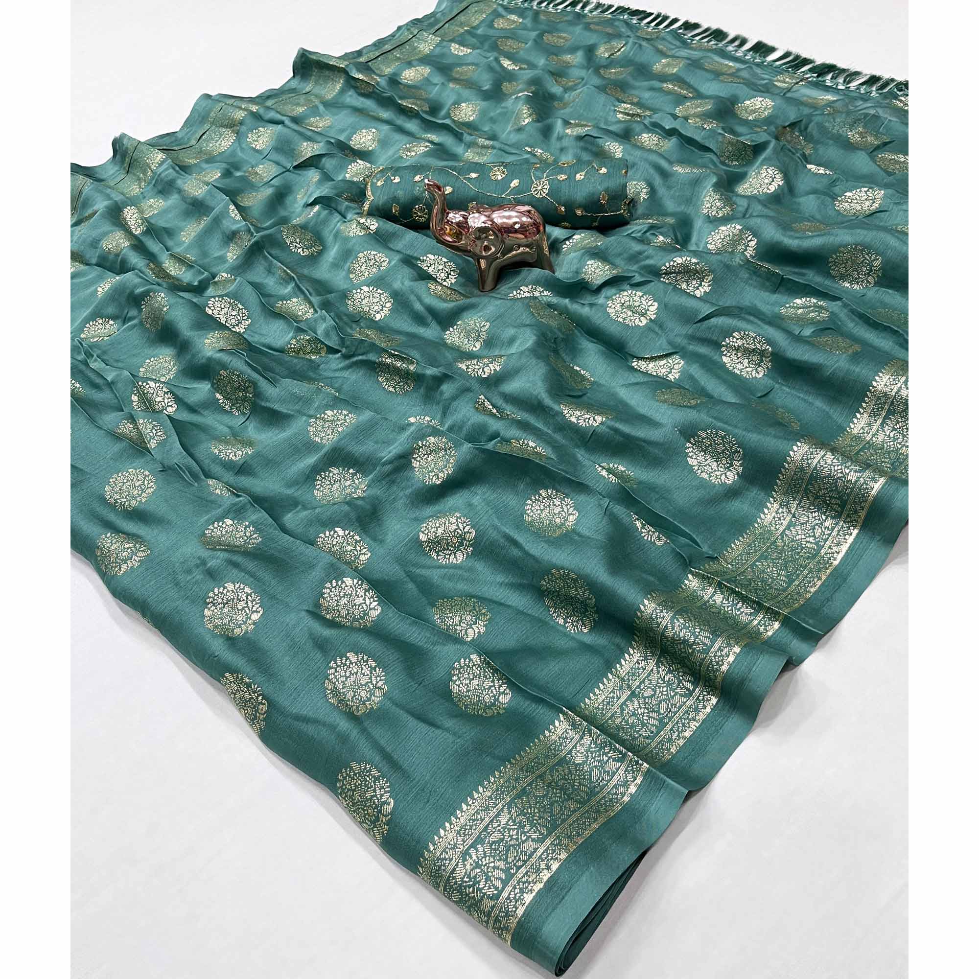Elegant Dusty Teal Foil Floral Printed Georgette Saree With Tassel Detailing Pallu