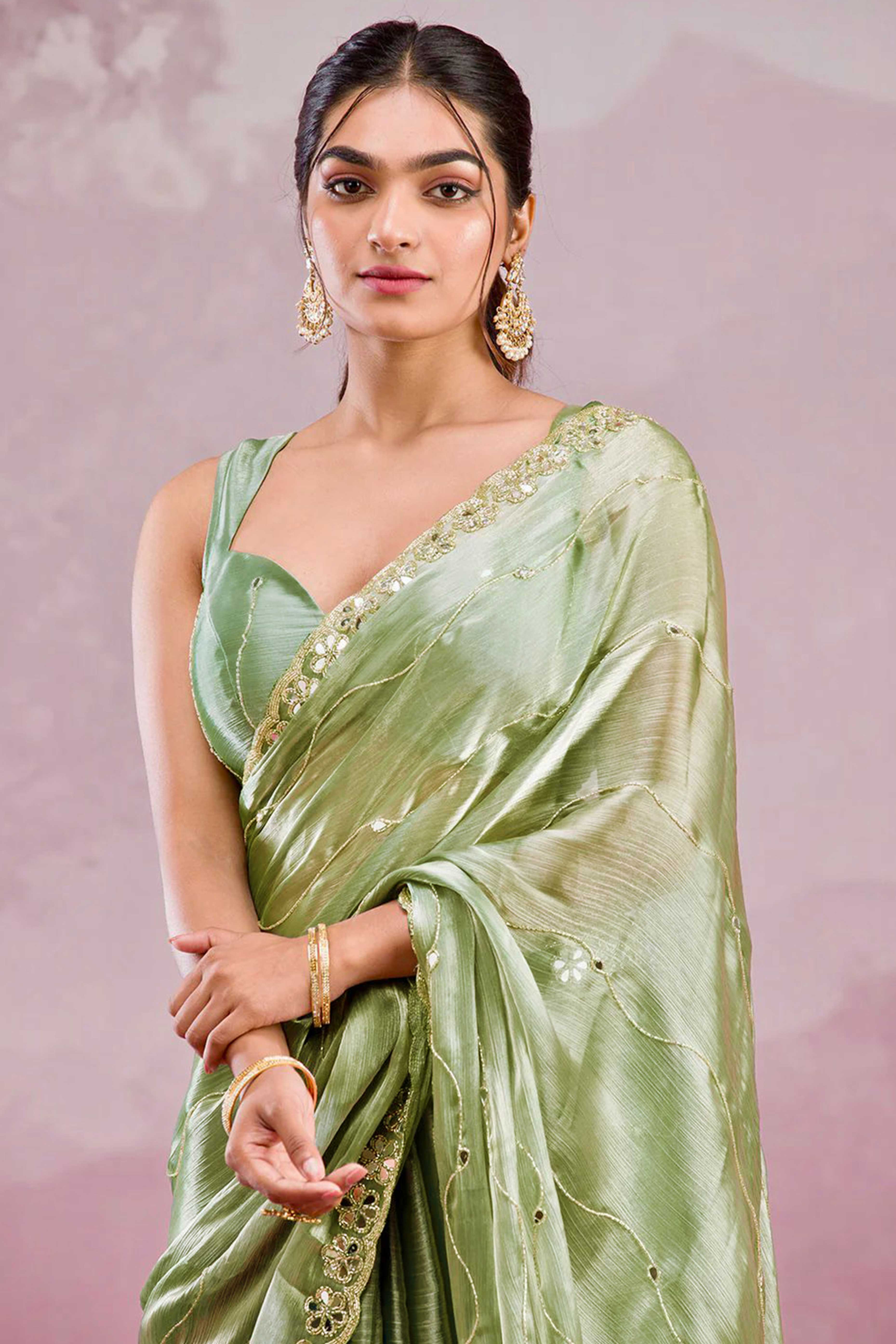 Pista Green Art Silk Saree Highlighted with Embroidery & Mirror Detailing