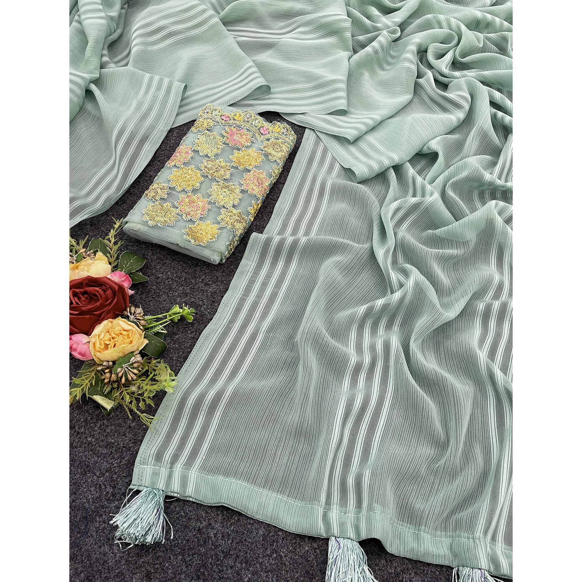 Sea Green Zari Striped Woven Georgette Saree