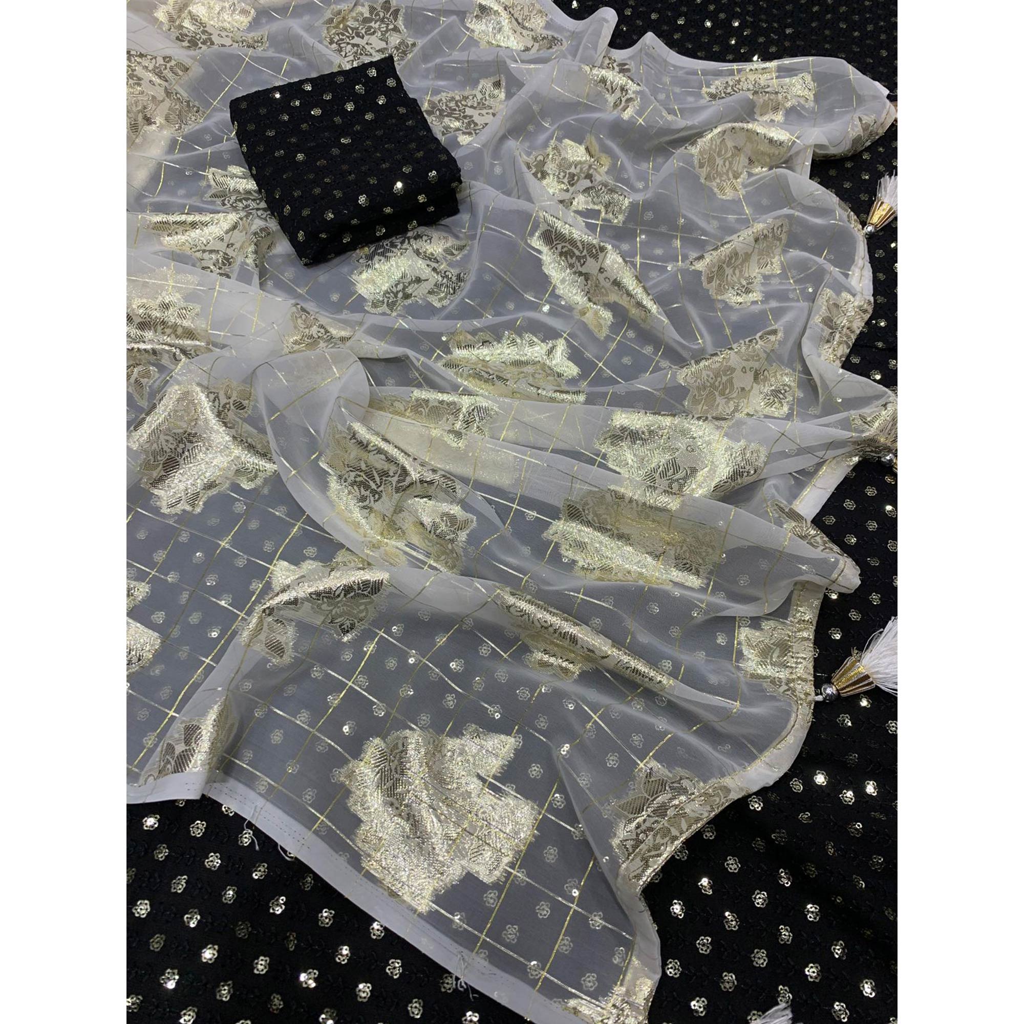 White Floral Woven Georgette Saree With Tassels