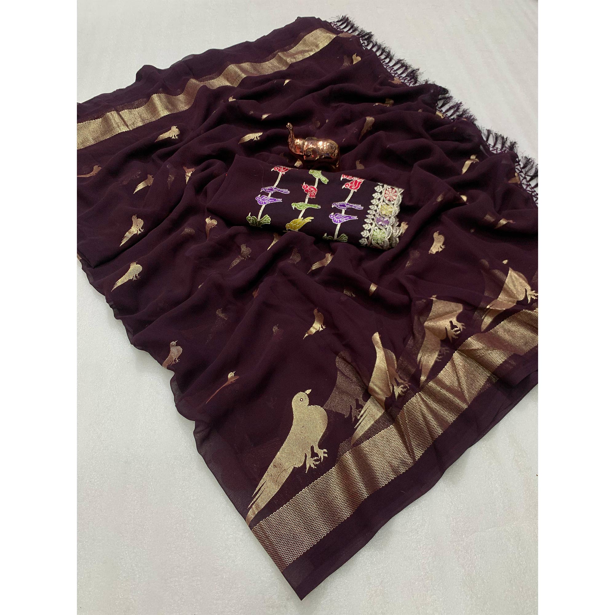 Wine Georgette Saree Adorned With Elegant Bird Embroidery