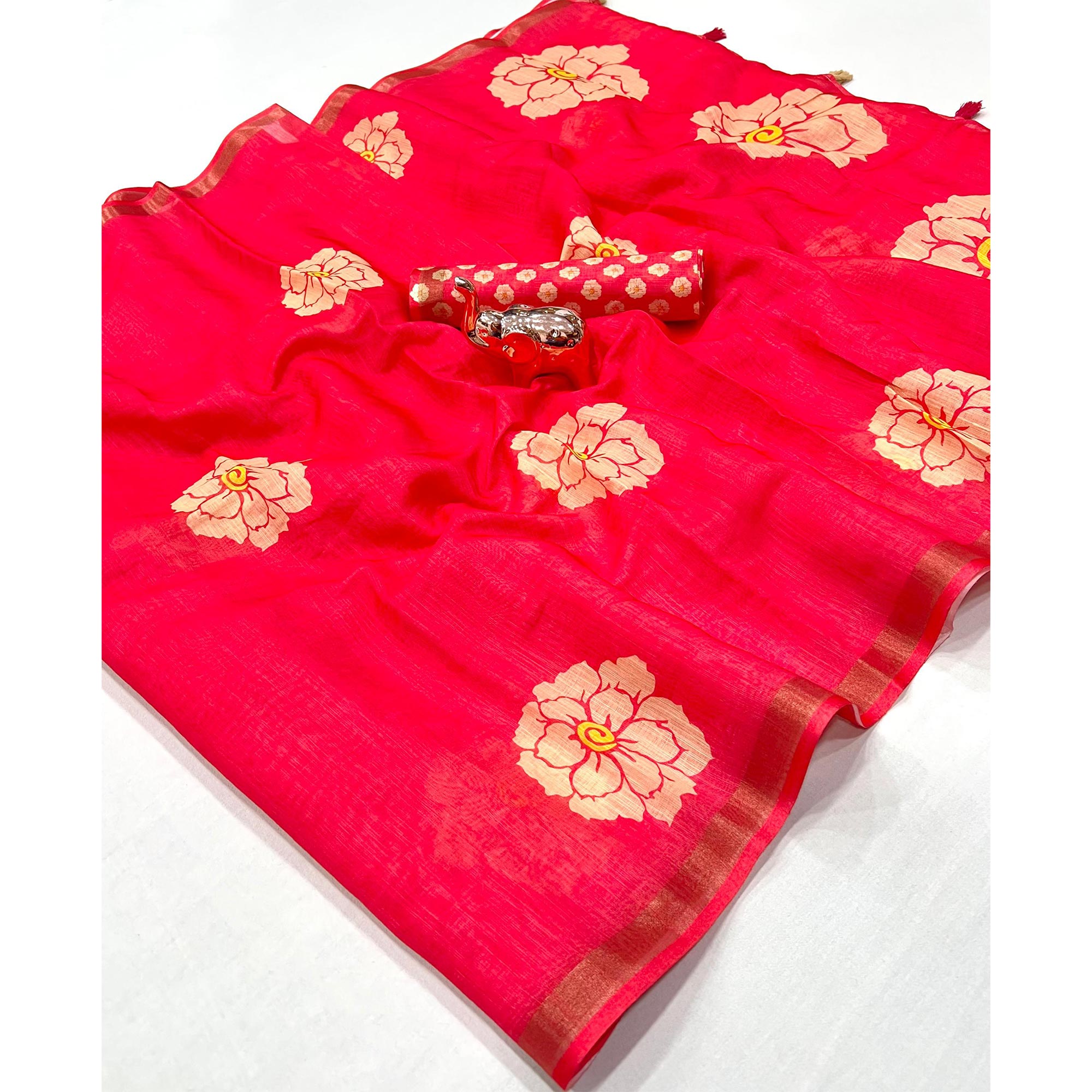 Graceful Pink Floral Printed Saree in Linen Silk with Delicate Tassel Accents
