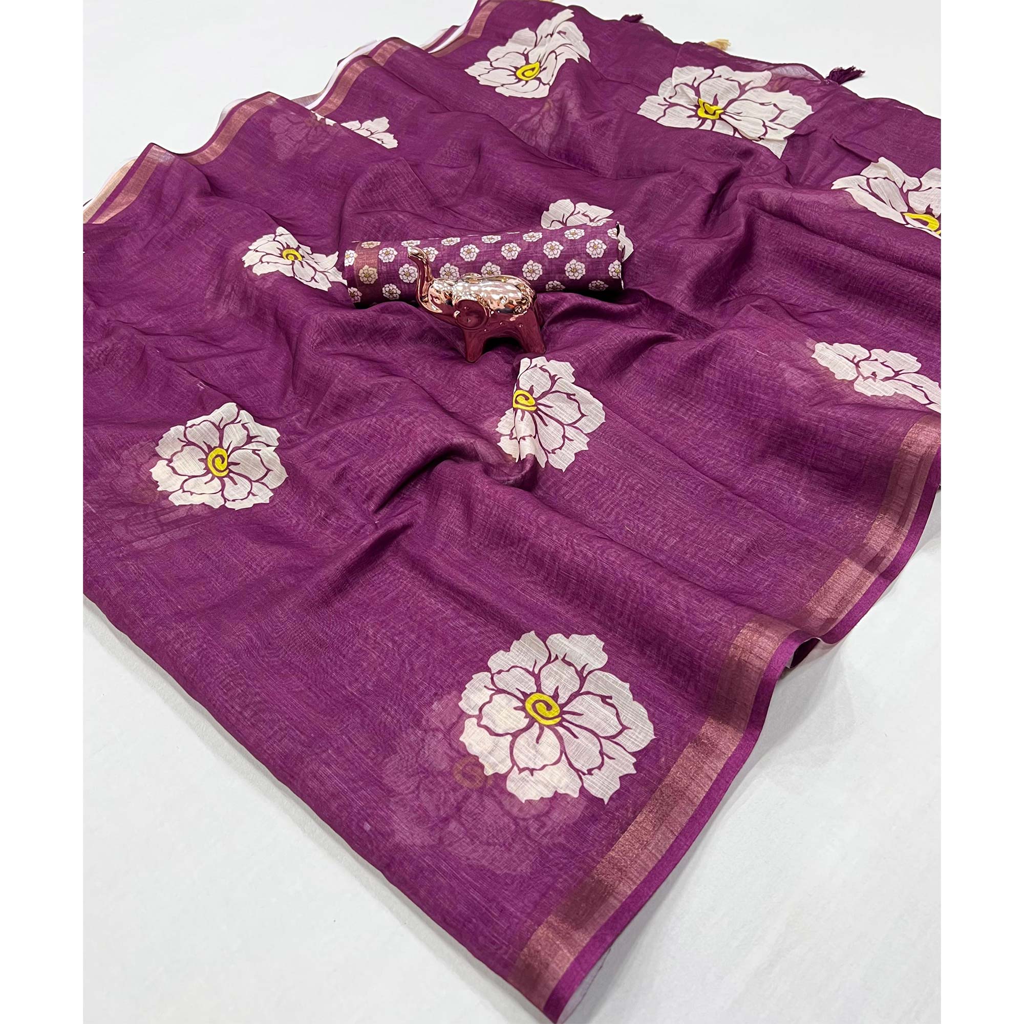 Graceful Purple Floral Printed Saree in Linen Silk with Delicate Tassel Accents
