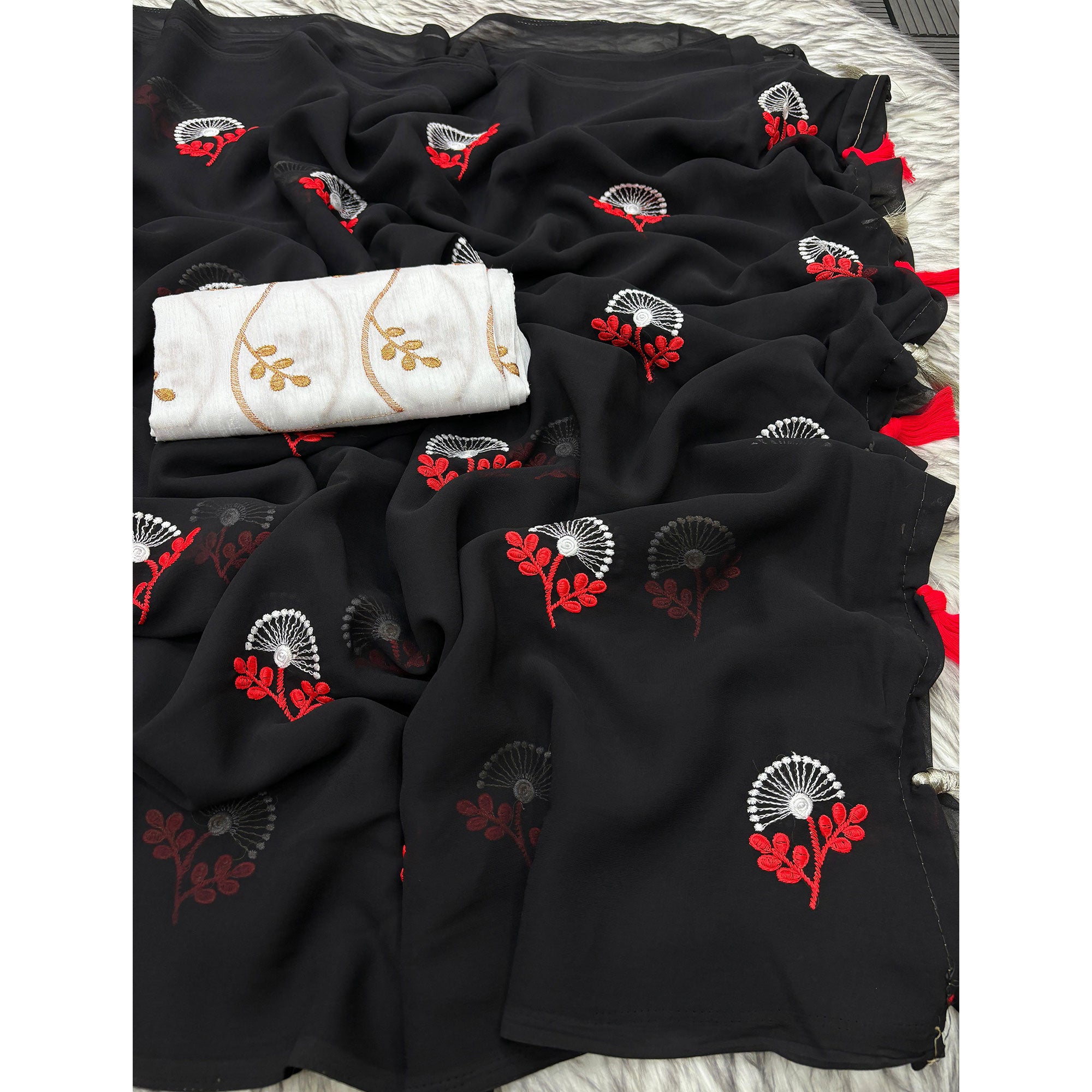 Black Floral Embroidered Georgette Saree With Tassels
