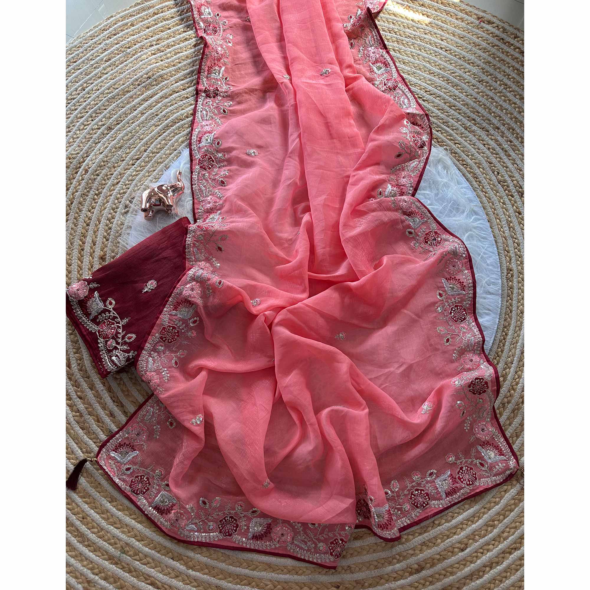 Peach Pure Silk Saree Showcasing Floral Sequins Embroidery With A Decorative Tassel Pallu