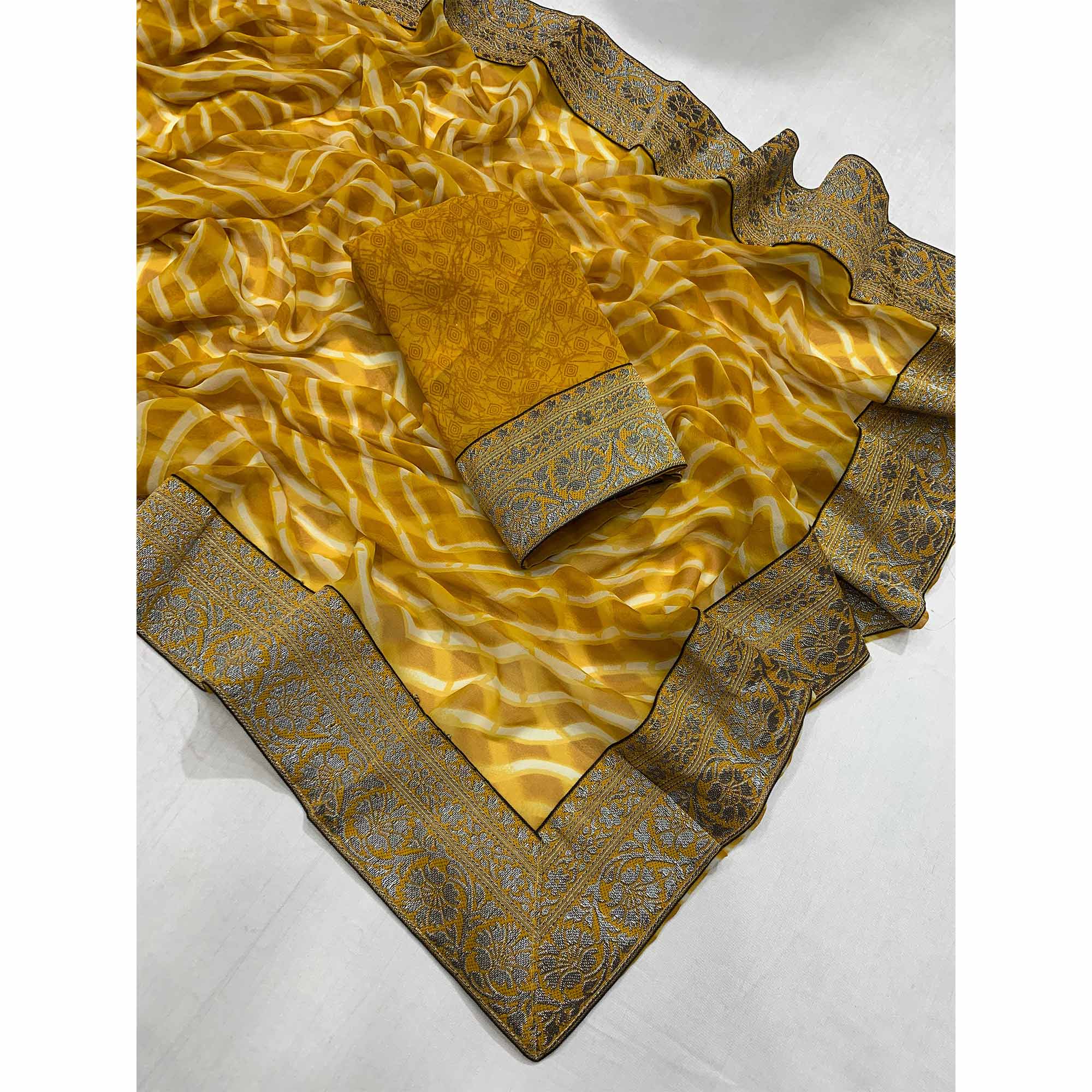 Mustard Leheriya Printed Georgette Saree With Woven Border
