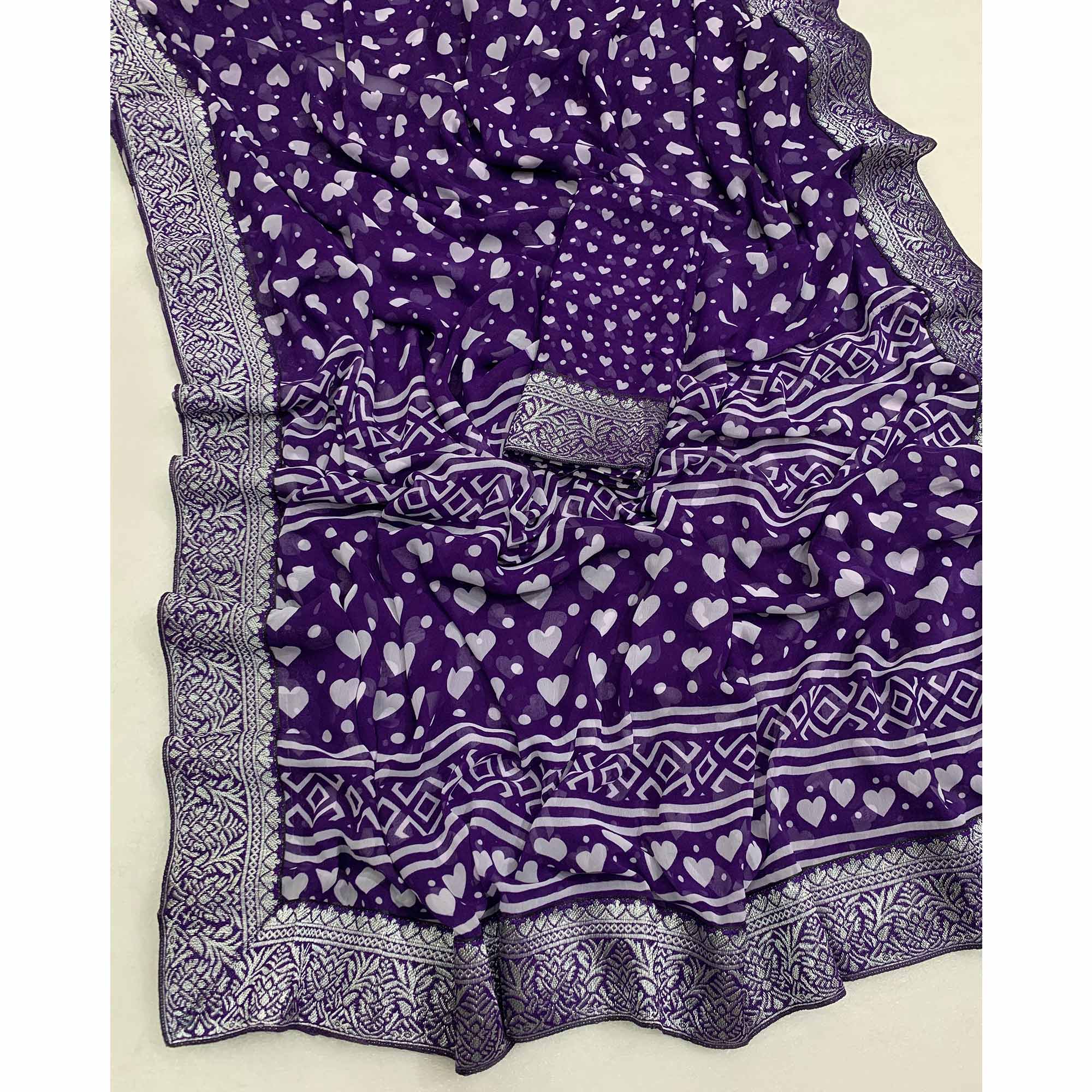 Purple Heart Printed Georgette Saree With Woven Border