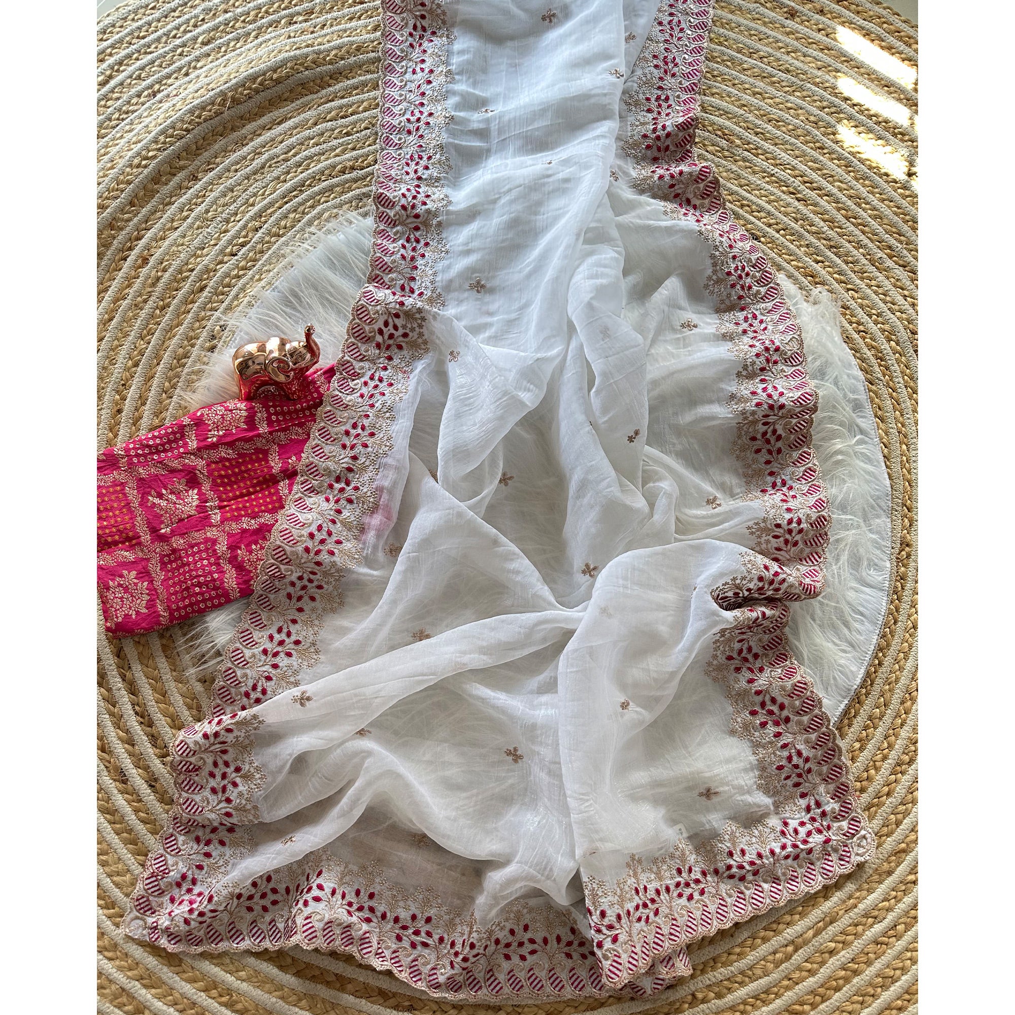 White Paper Crush Pure Silk Saree Featuring Intricate Floral Embroidery Craftsmanship